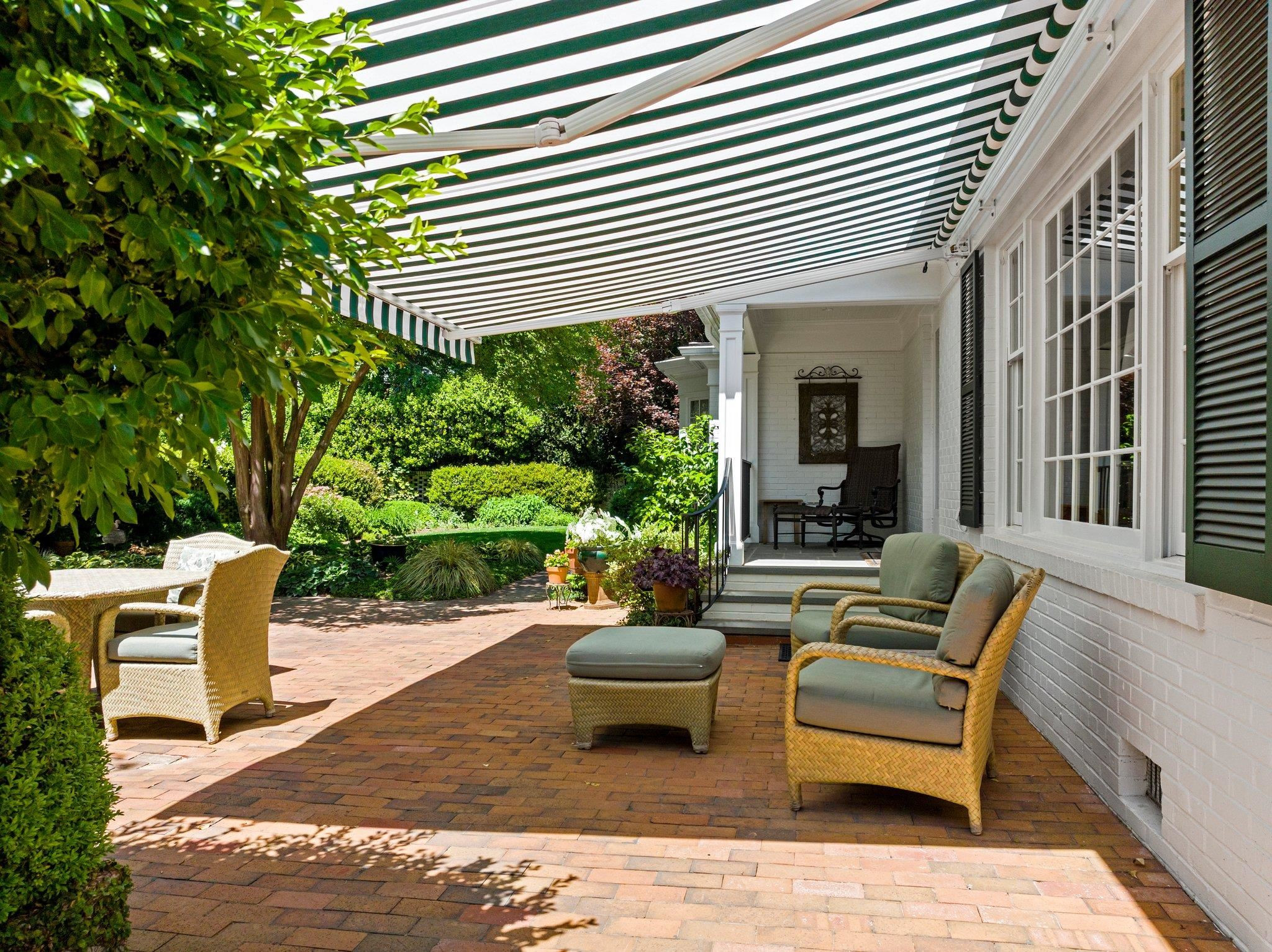 2217 St Marys Street Raleigh, NC 27608 - Photo 40 of 52 Remote control awning allows for as much or little shade as desired Retractable awning