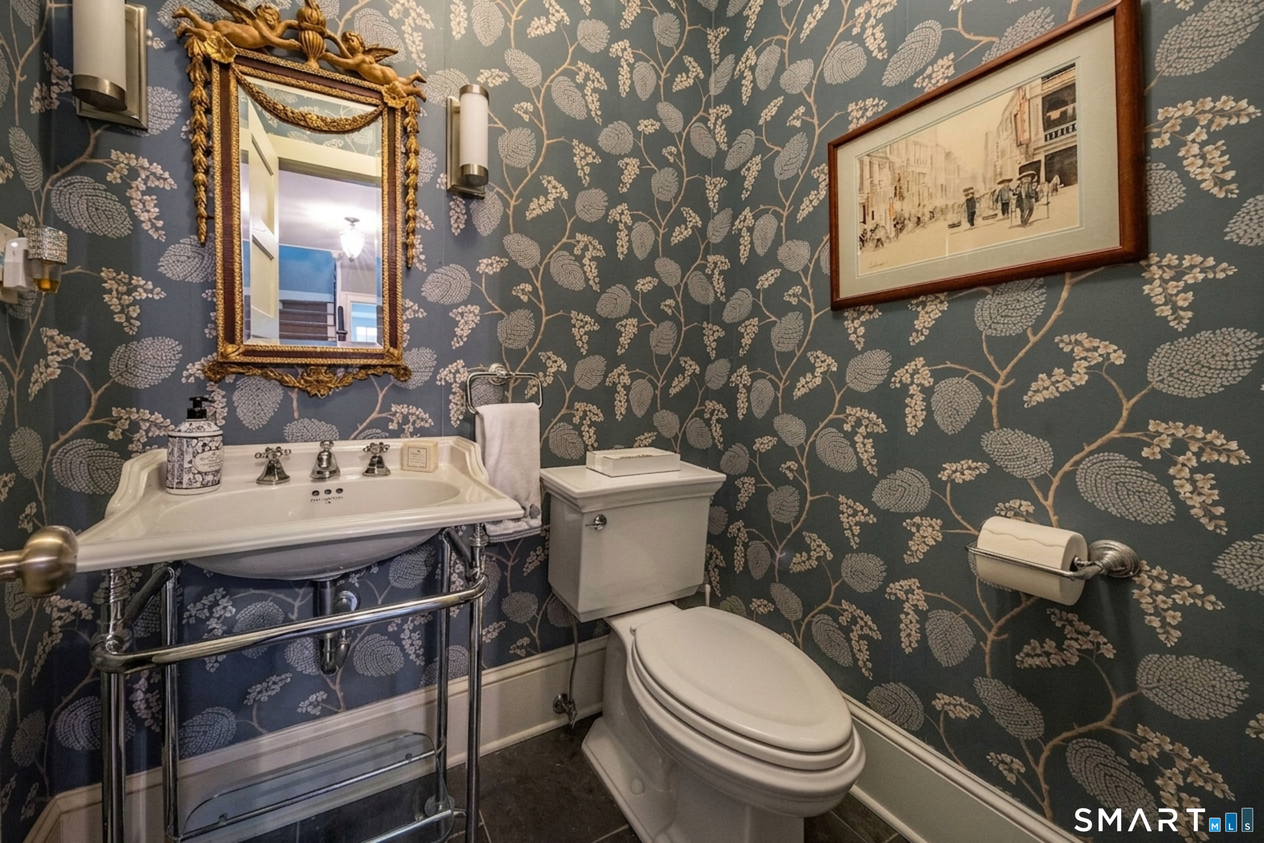 880 Boston Post Road Madison, CT 06443 - Photo 17 of 40 a bathroom with a sink and a toilet
