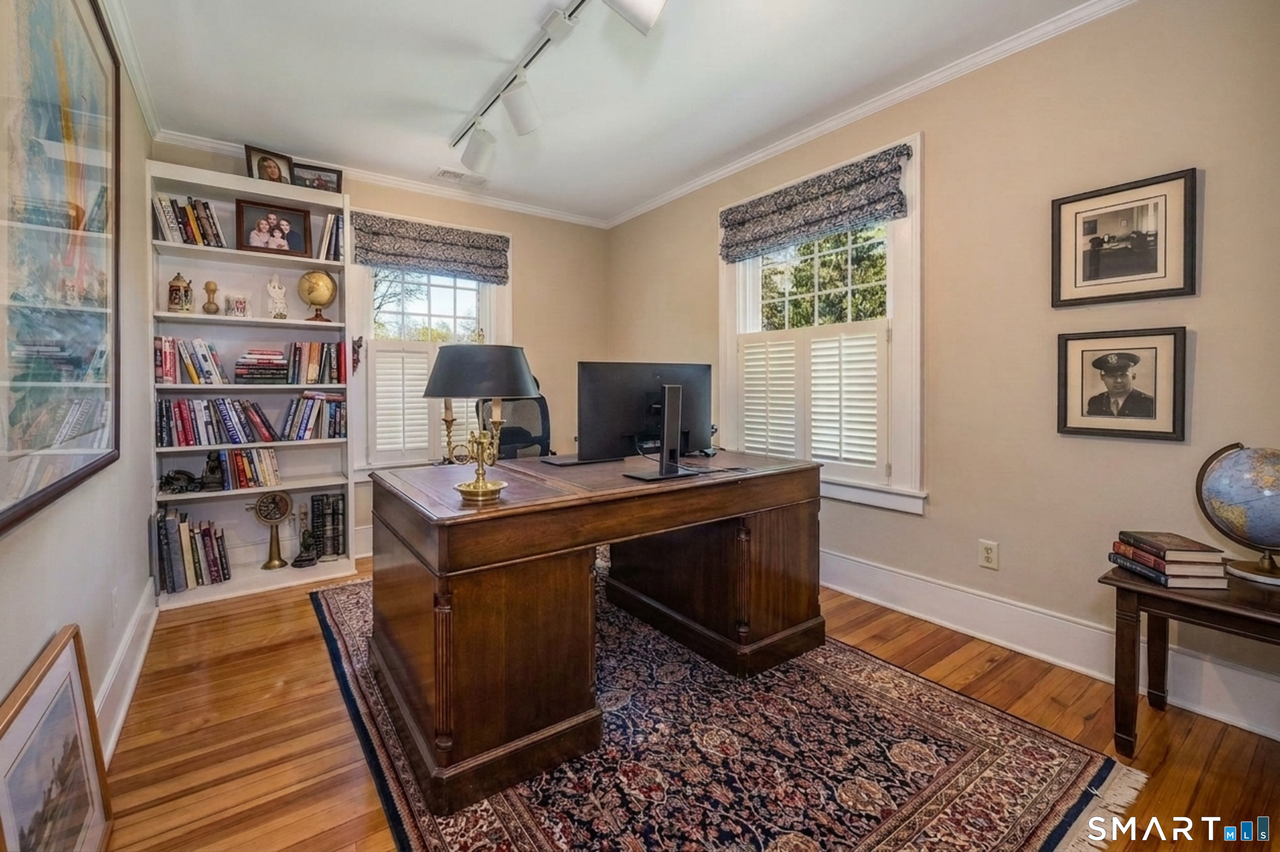880 Boston Post Road Madison, CT 06443 - Photo 28 of 40 a view of a workspace with furniture and a window