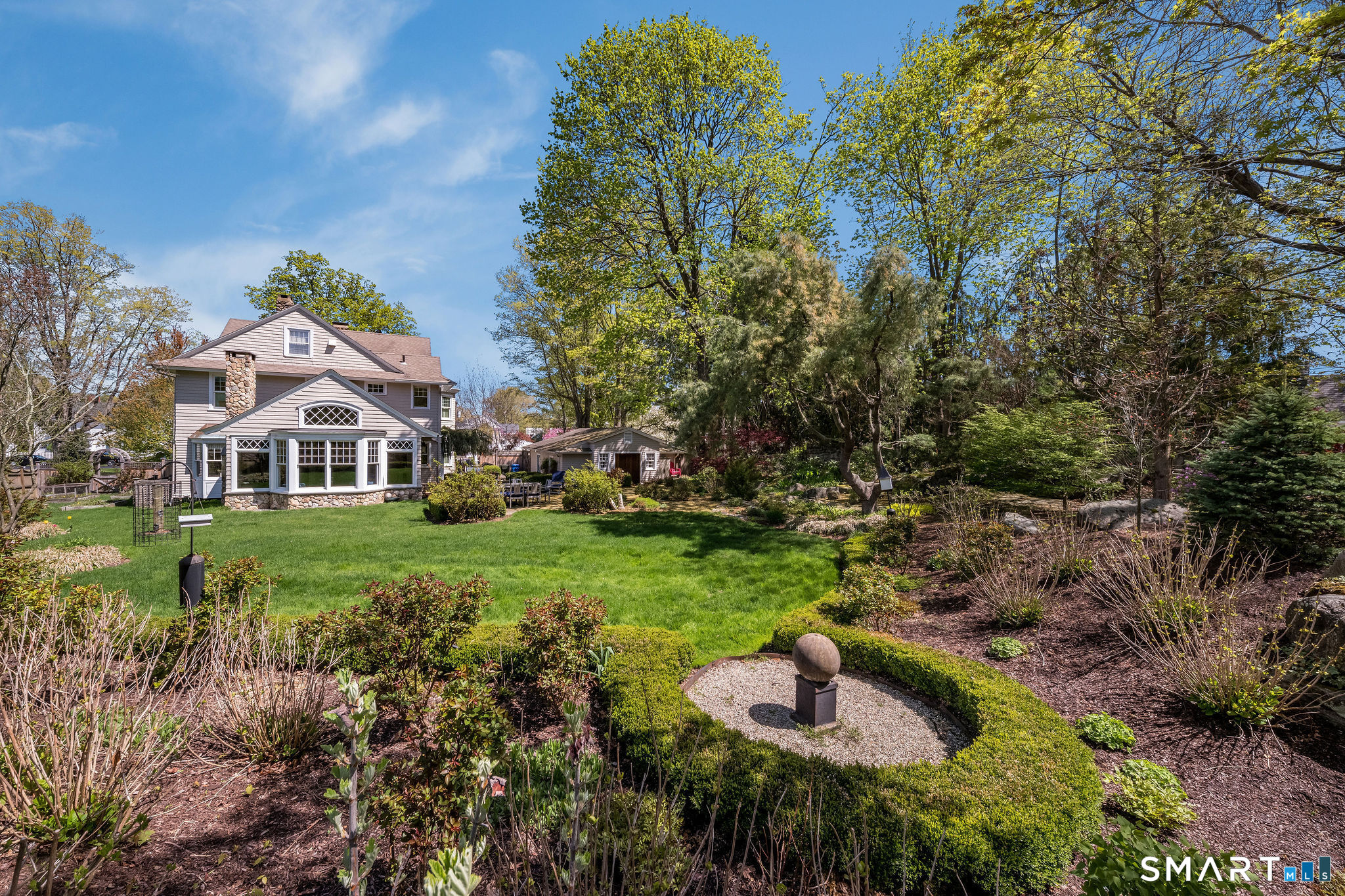 880 Boston Post Road Madison, CT 06443 - Photo 4 of 40 a aerial view of a house with a yard