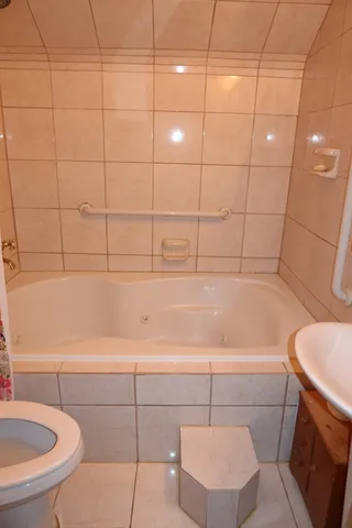 a bathroom with a sink and toilet