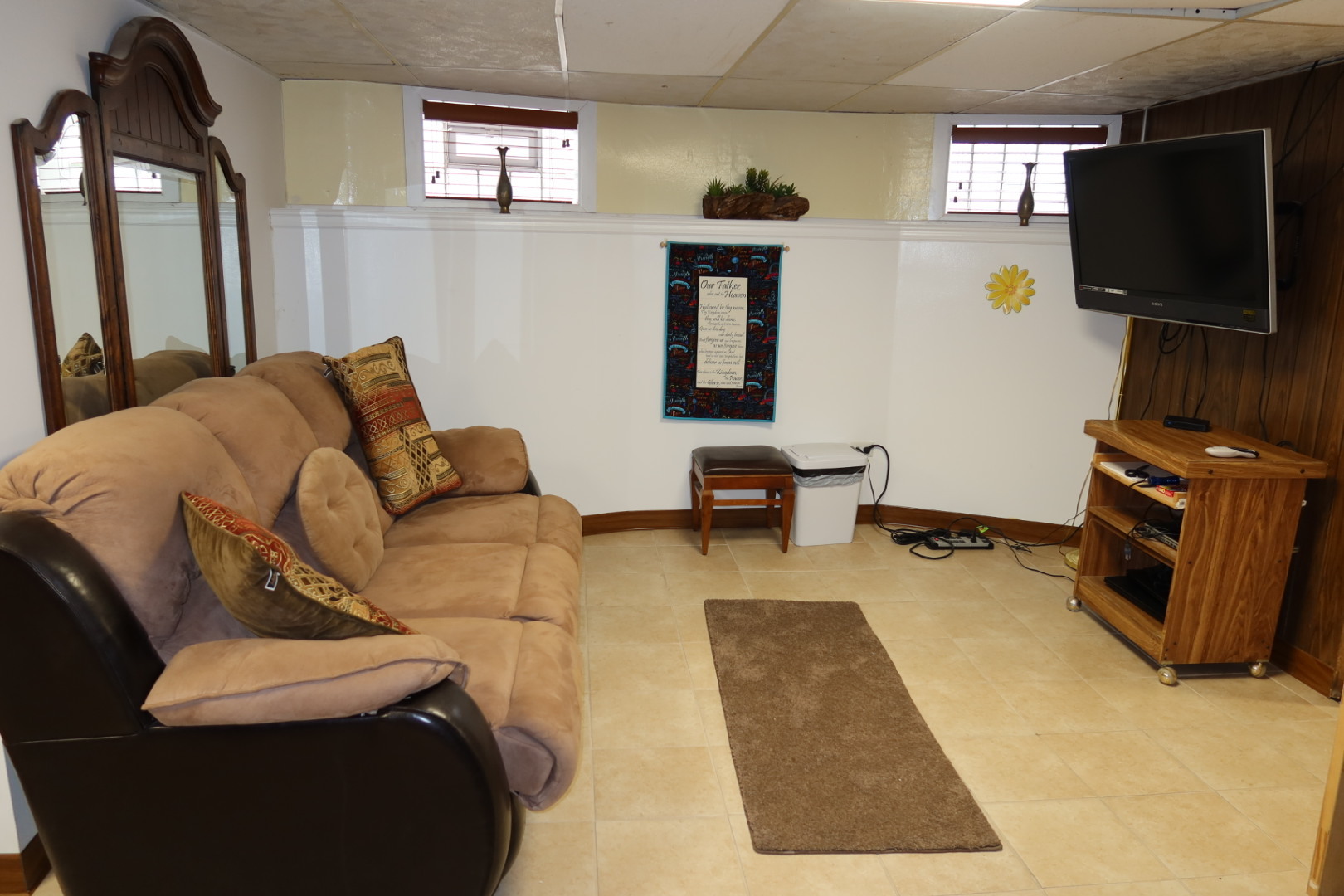 9766 South Prospect Avenue Chicago, IL 60643 - Photo 15 of 19 a living room with furniture and a flat screen tv