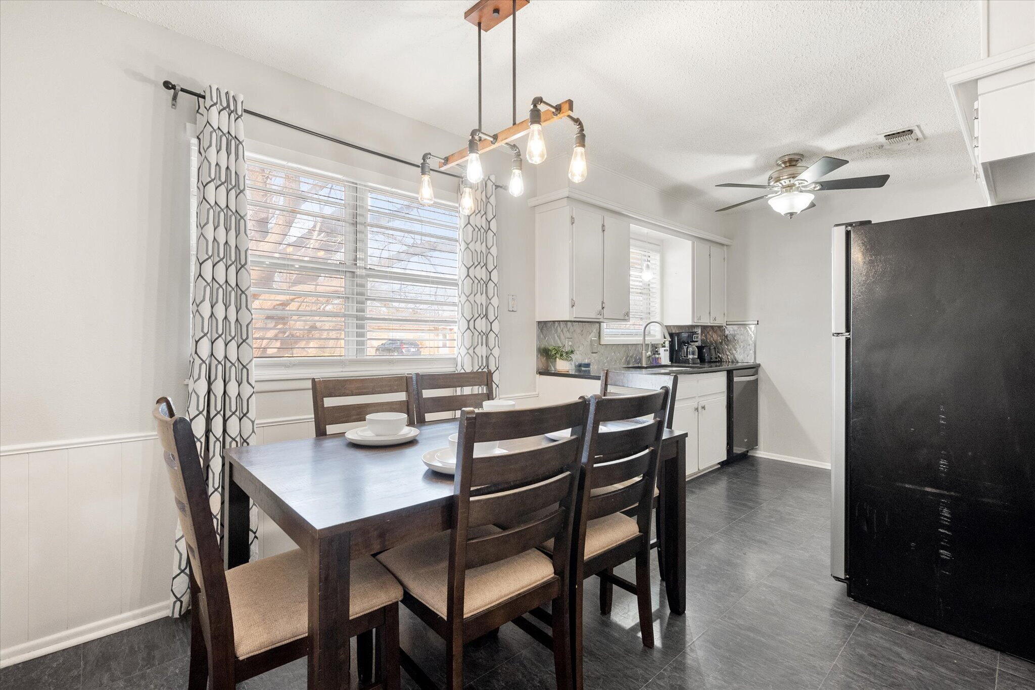 4803 8th Street Lubbock, TX 79416 - Photo 11 of 29 a dining room with furniture and window
