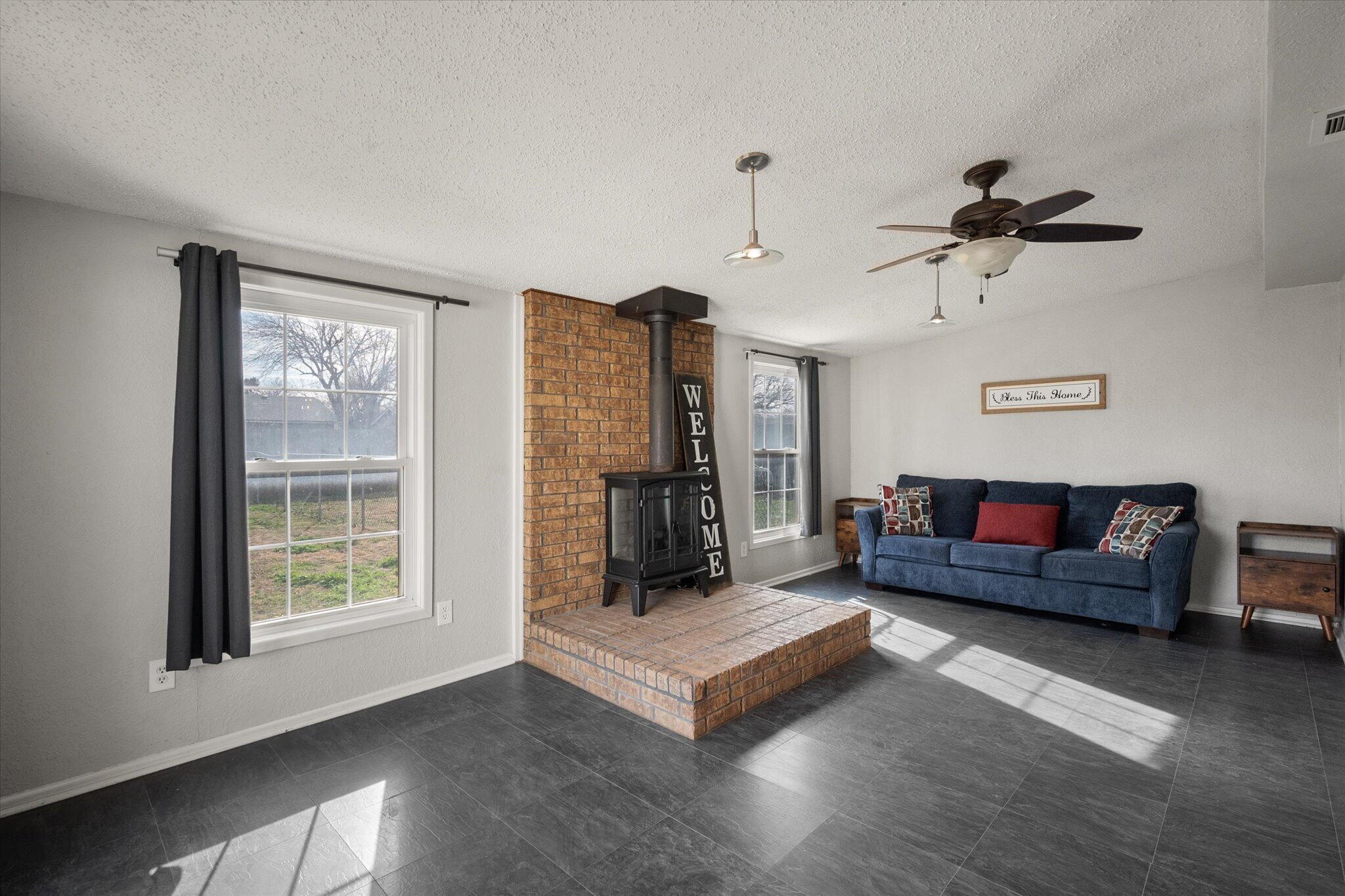 4803 8th Street Lubbock, TX 79416 - Photo 17 of 29 a living room with furniture and a window