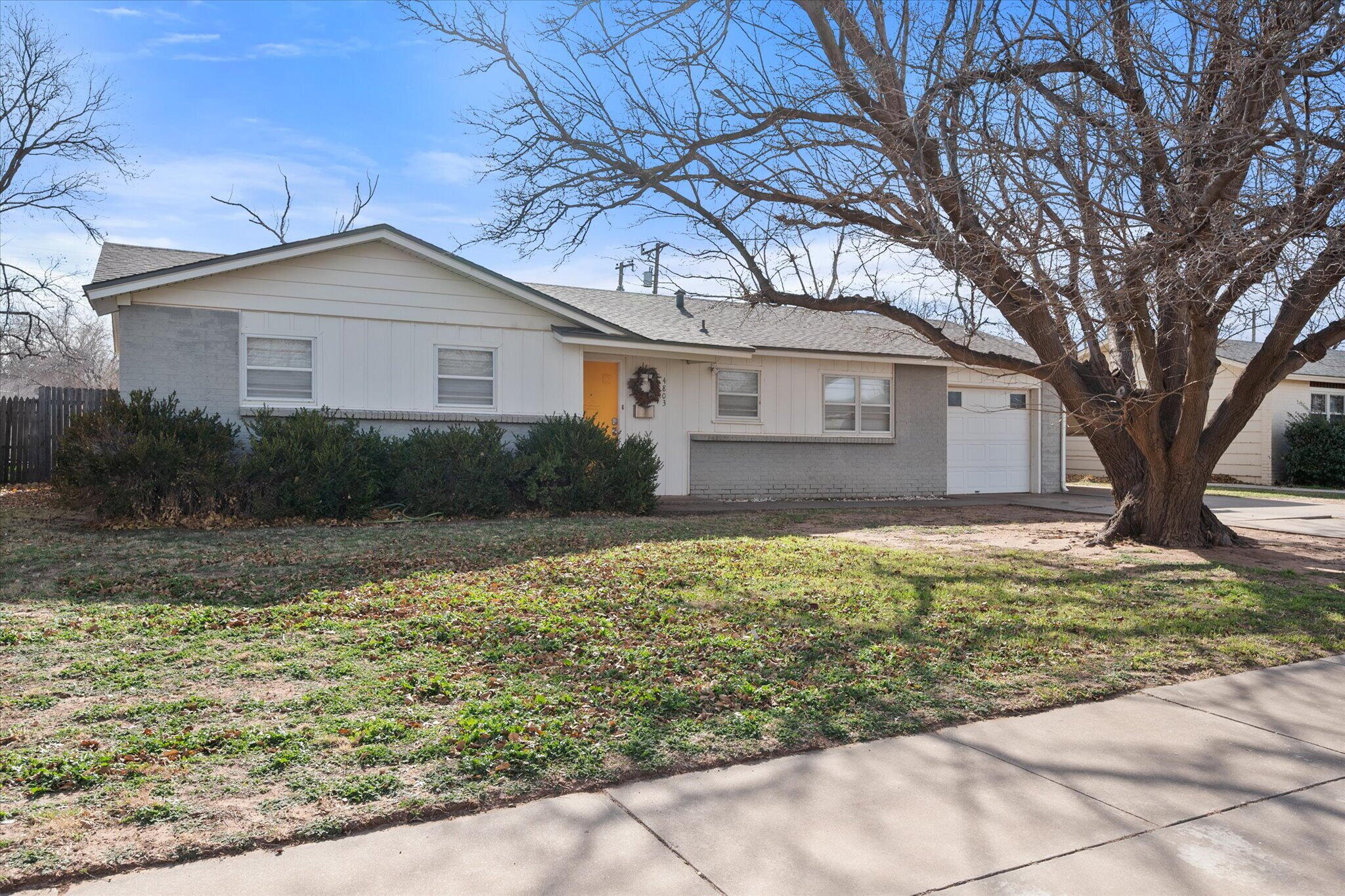 4803 8th Street Lubbock, TX 79416 - Photo 3 of 29 a house with trees in the background