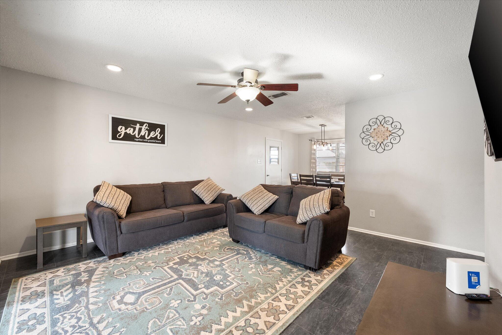 4803 8th Street Lubbock, TX 79416 - Photo 10 of 29 a living room with a couch