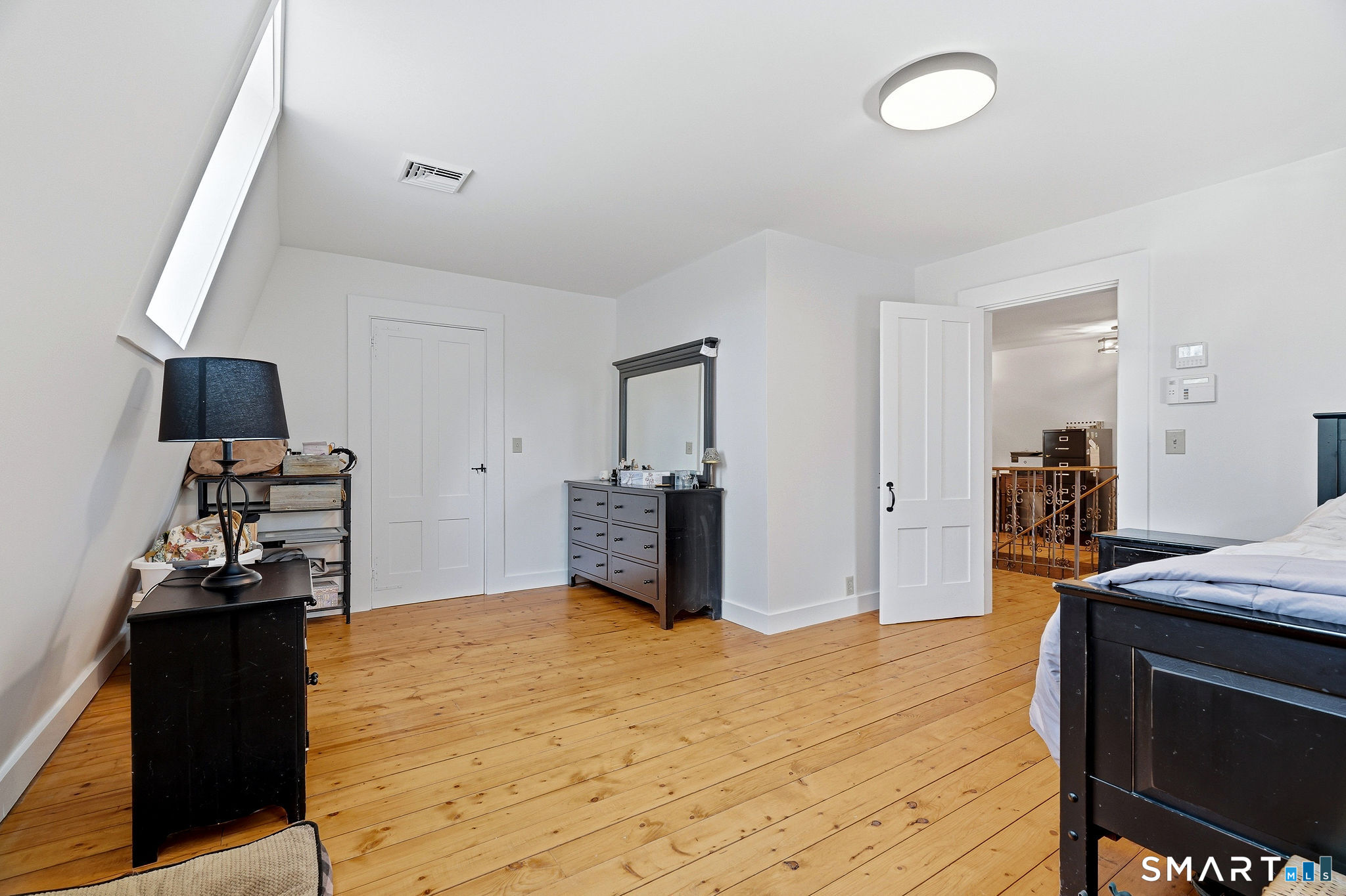 61 Mystic Road North Stonington, CT 06359 - Photo 9 of 40 a view of a kitchen with dining room and wooden furniture