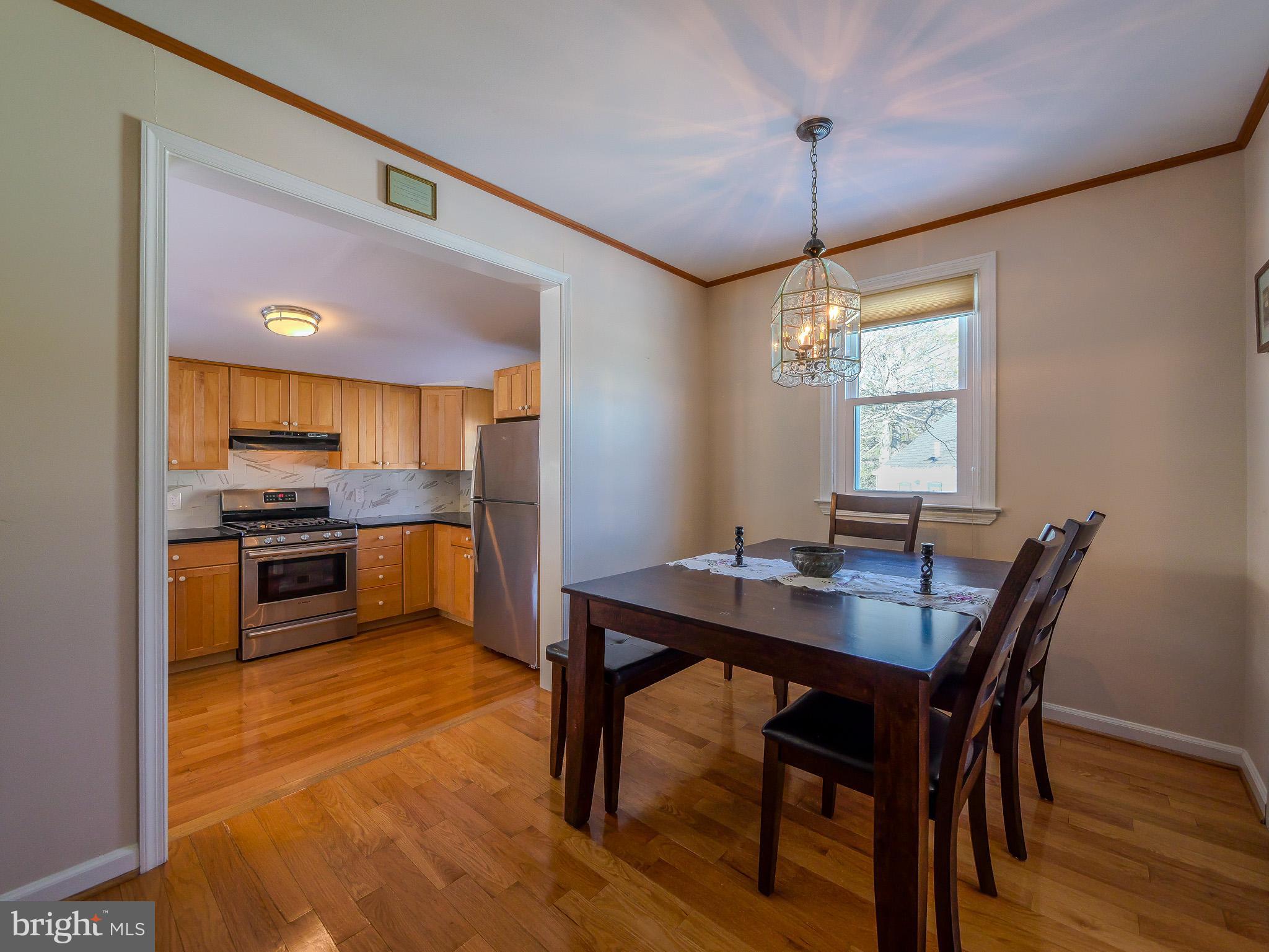 118 North Line Road Newtown Square, PA 19073 - Photo 14 of 69 a kitchen with a table and chairs in it