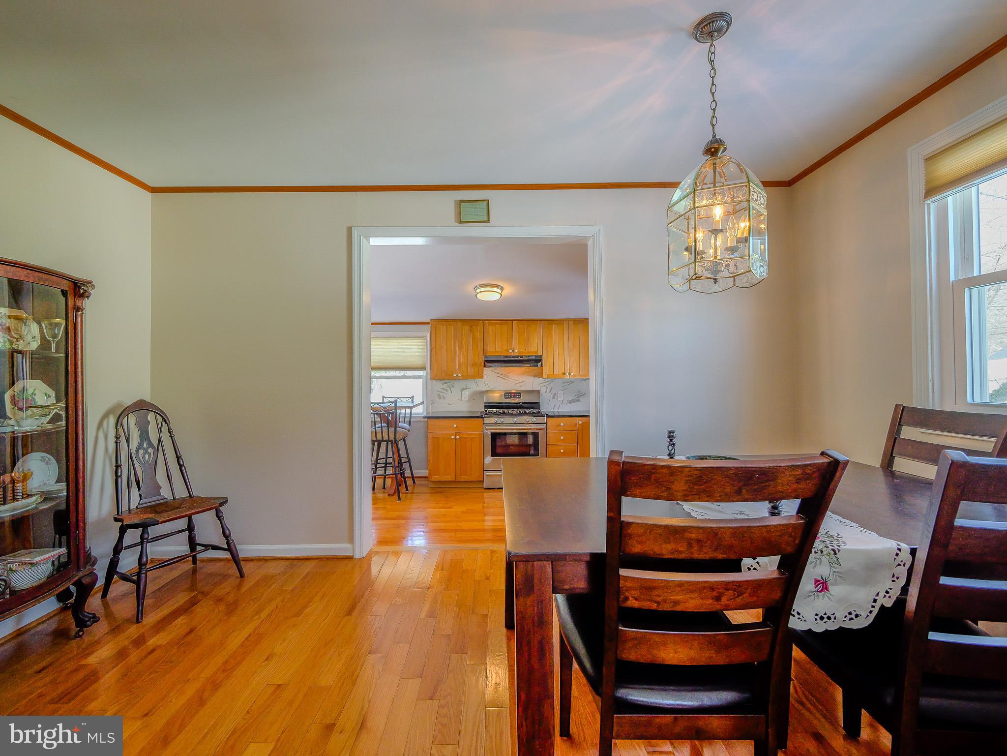118 North Line Road Newtown Square, PA 19073 - Photo 15 of 69 a view of a dining room with furniture and wooden floor