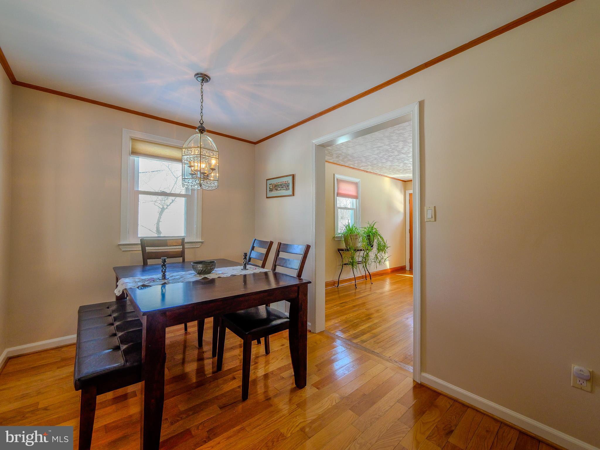 118 North Line Road Newtown Square, PA 19073 - Photo 18 of 69 a view of a dining room with furniture window and wooden floor