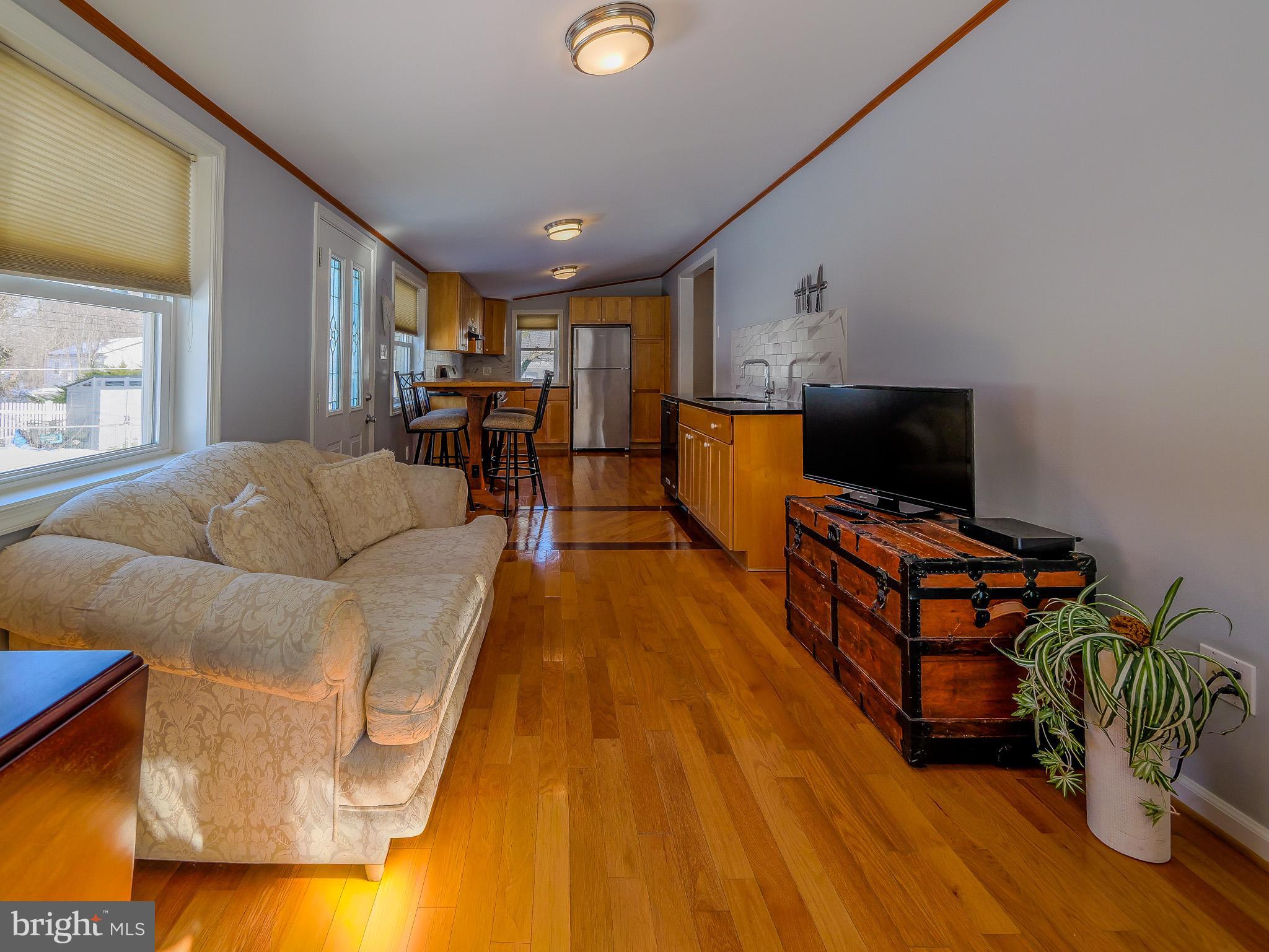 118 North Line Road Newtown Square, PA 19073 - Photo 31 of 69 a living room with furniture and a flat screen tv