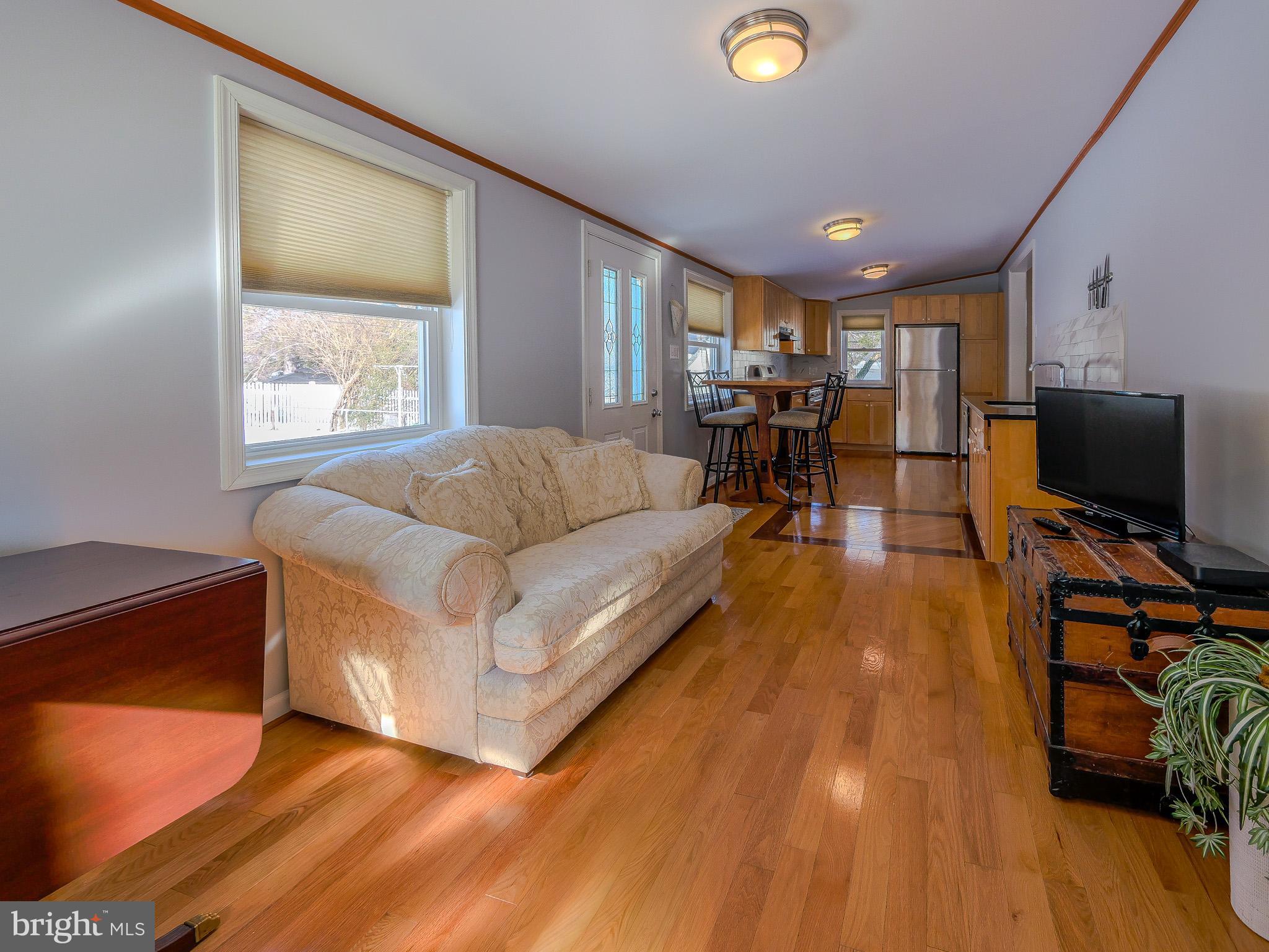 118 North Line Road Newtown Square, PA 19073 - Photo 32 of 69 a living room with furniture and a flat screen tv