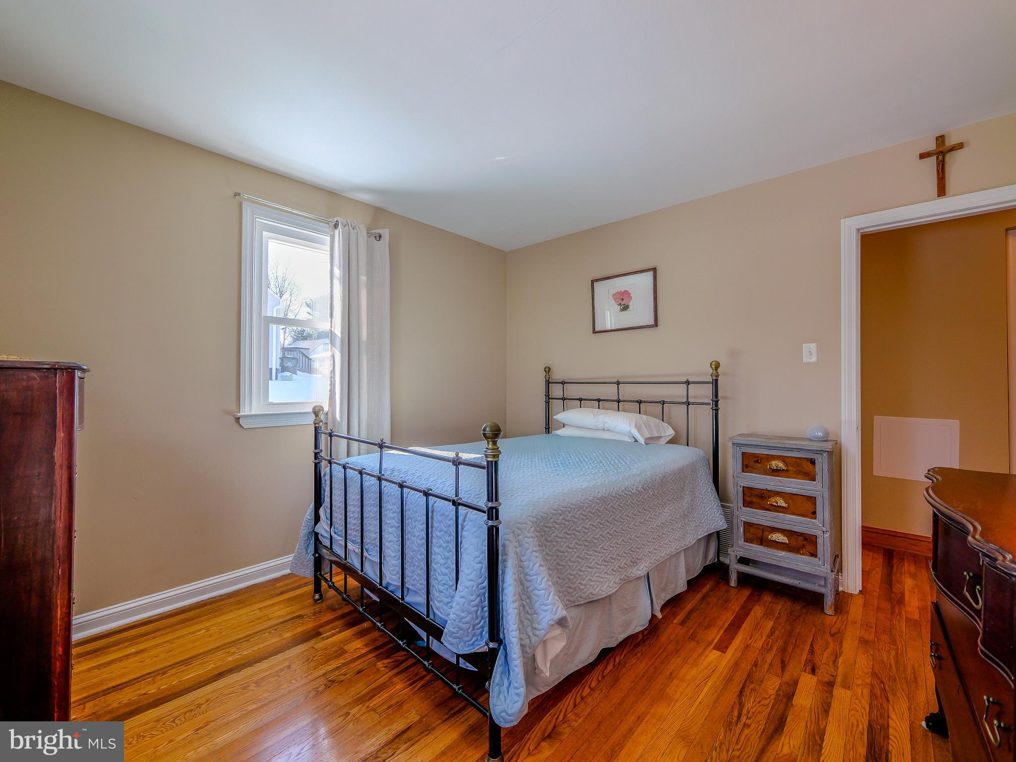 118 North Line Road Newtown Square, PA 19073 - Photo 43 of 69 a bedroom with a bed and a tv