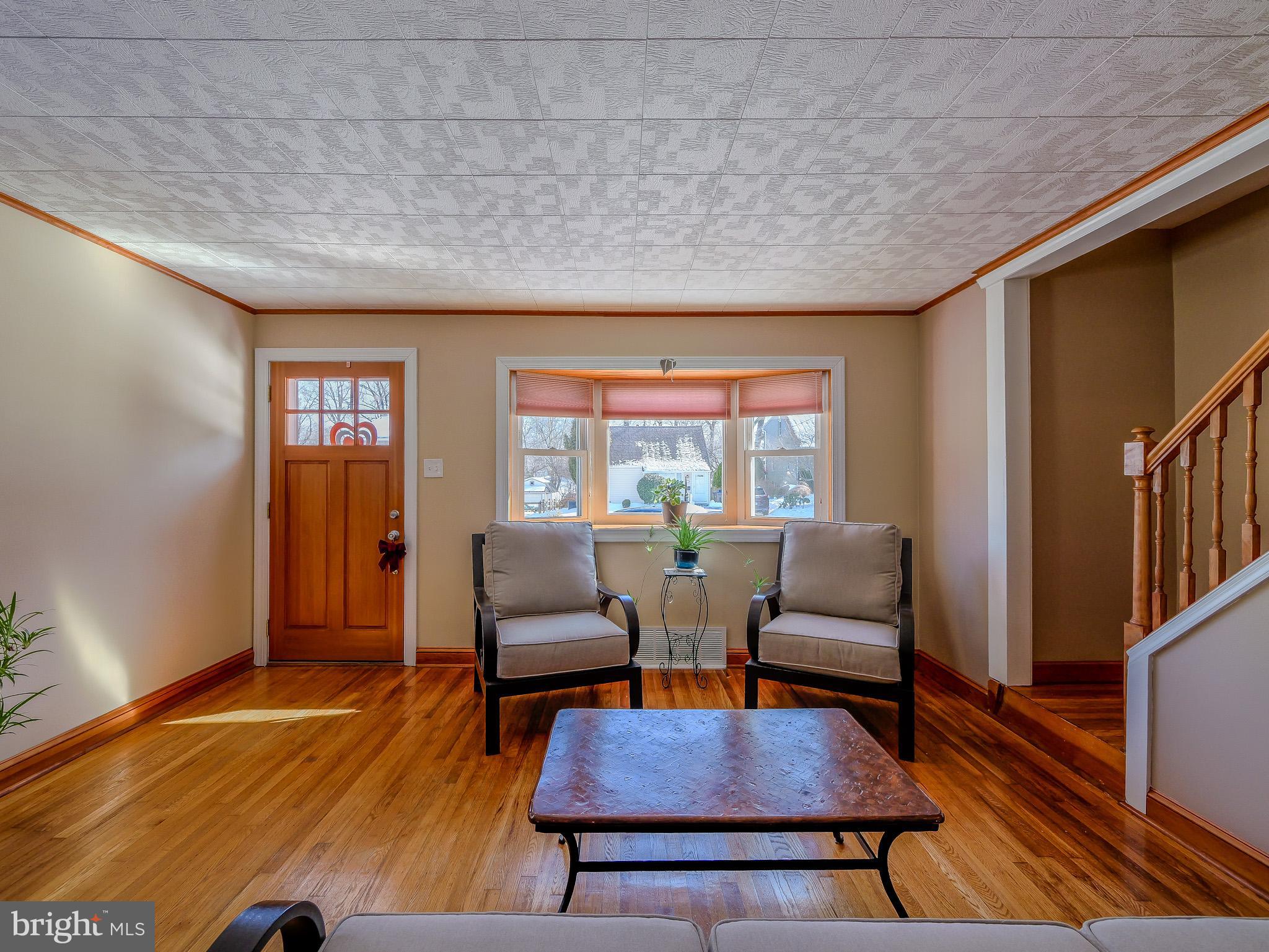 118 North Line Road Newtown Square, PA 19073 - Photo 8 of 69 a living room with furniture a rug and a window