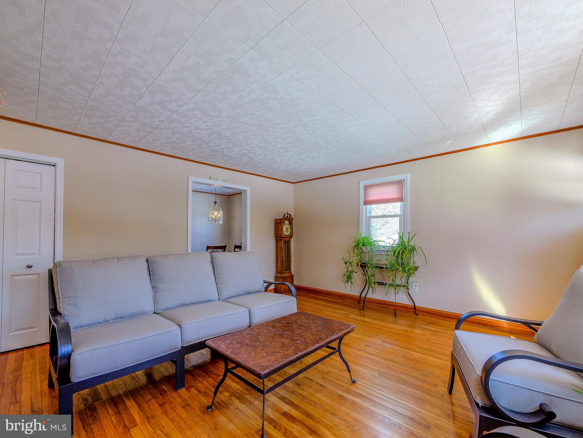 118 North Line Road Newtown Square, PA 19073 - Photo 10 of 69 a living room with furniture and wooden floor