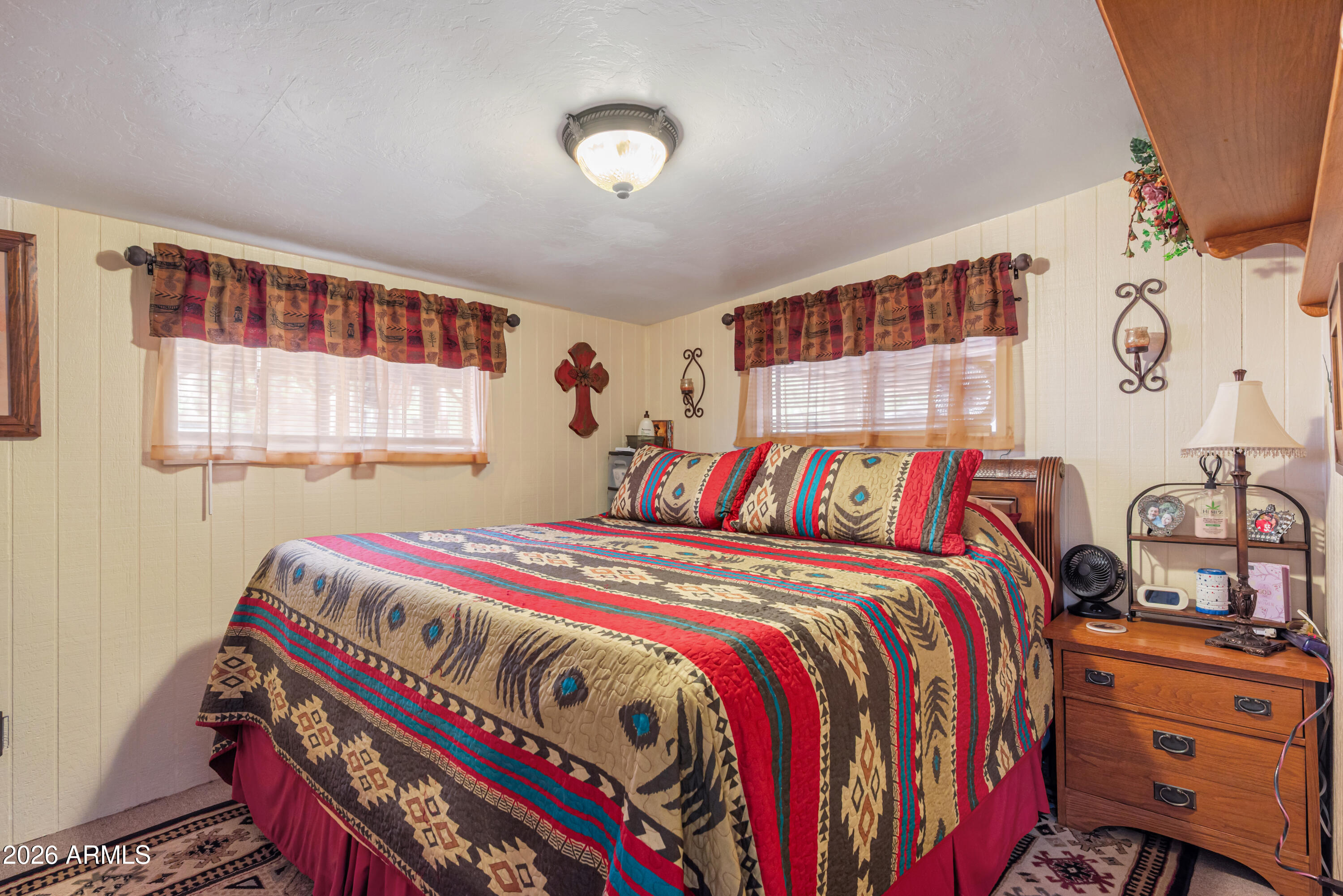 1659 Mormon Road Happy Jack, AZ 86024 - Photo 19 of 37 a bed room with a bed and a window