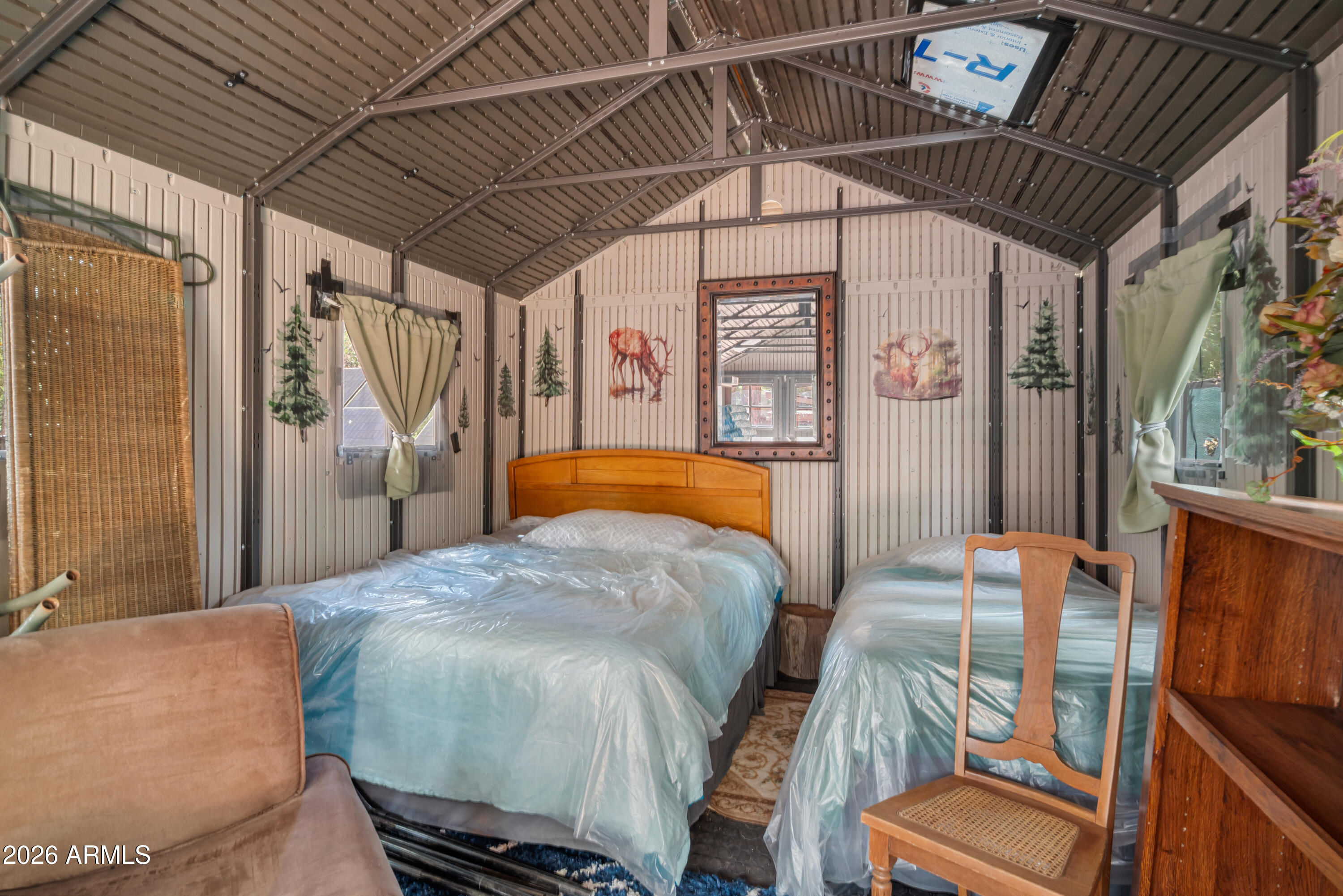 1659 Mormon Road Happy Jack, AZ 86024 - Photo 22 of 37 a bedroom with furniture and wooden floor