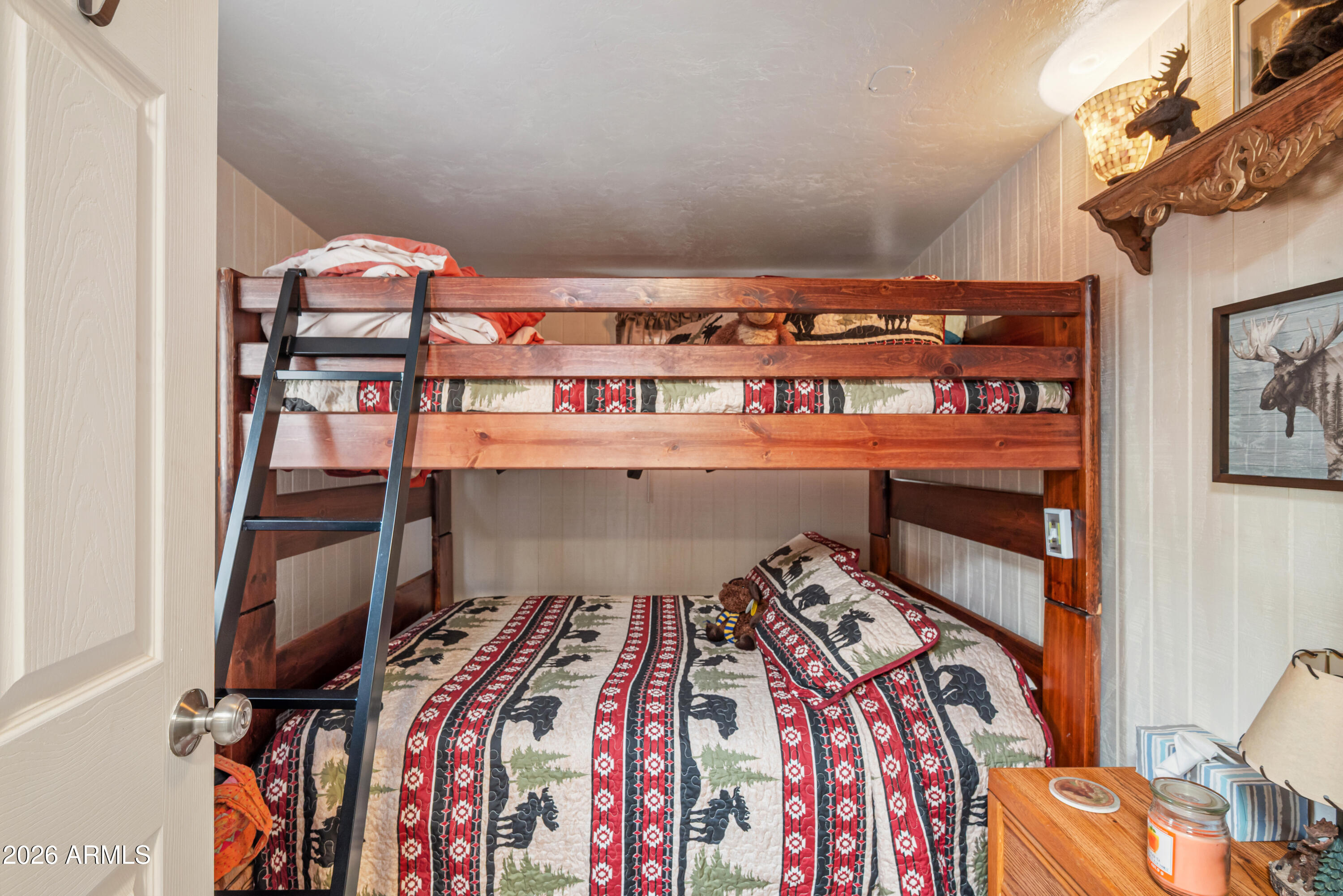 1659 Mormon Road Happy Jack, AZ 86024 - Photo 23 of 37 a bed room with a bed