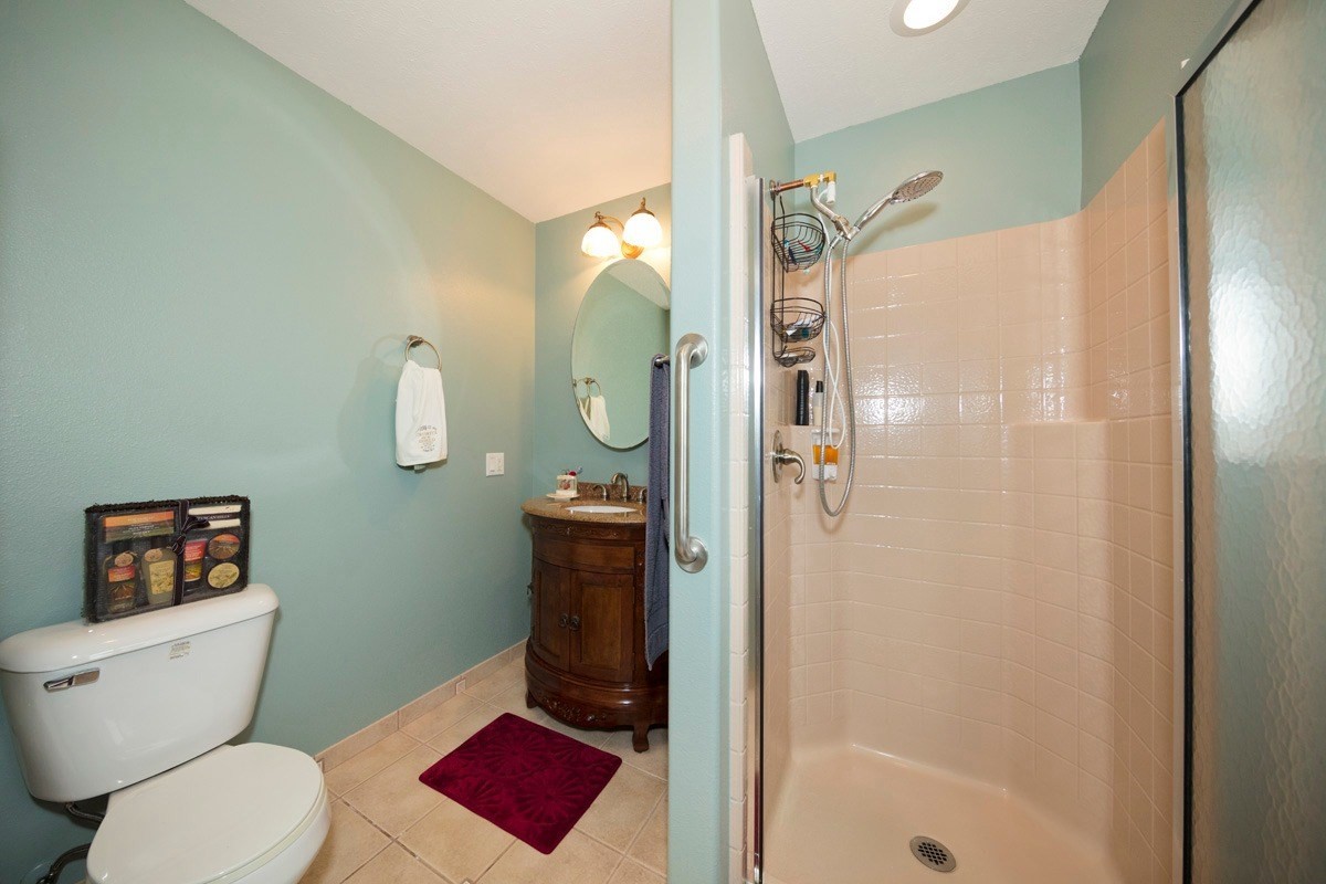 18-4235 North Pszyk Road Mountain View, HI 96771 - Photo 14 of 30 a bathroom with a toilet and a shower