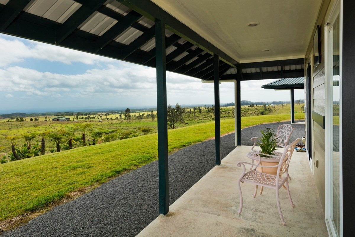 18-4235 North Pszyk Road Mountain View, HI 96771 - Photo 20 of 30 a view of a swimming pool with an outdoor seating