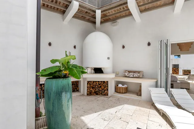 a bathroom with a double vanity sink toilet and shower