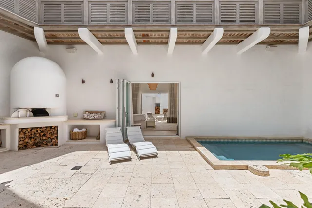 a bathroom with a bathtub and a toilet