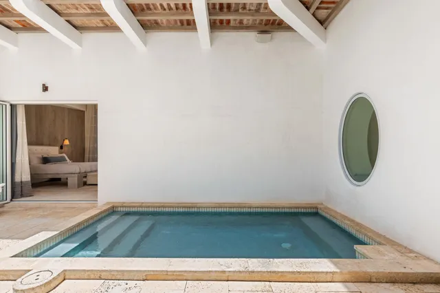 a kitchen with a white stove top oven and sink