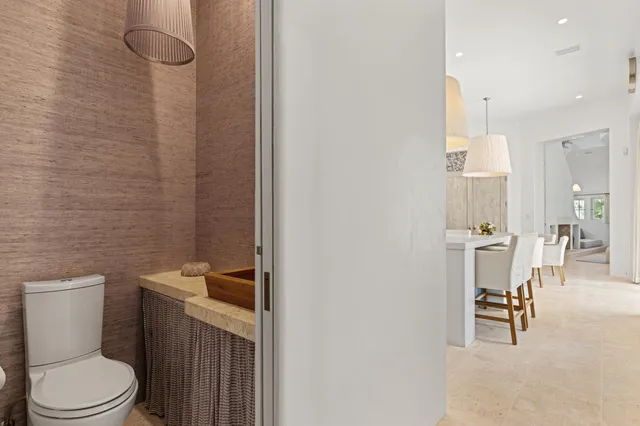 a living room with furniture and white walls