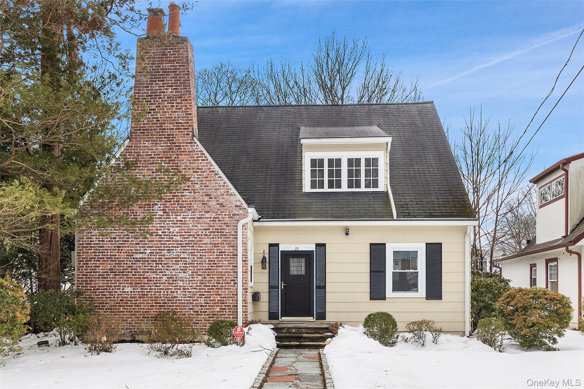 23 Garretson Road White Plains, NY 10604 - Photo 1 of 33 a front view of a house with a yard