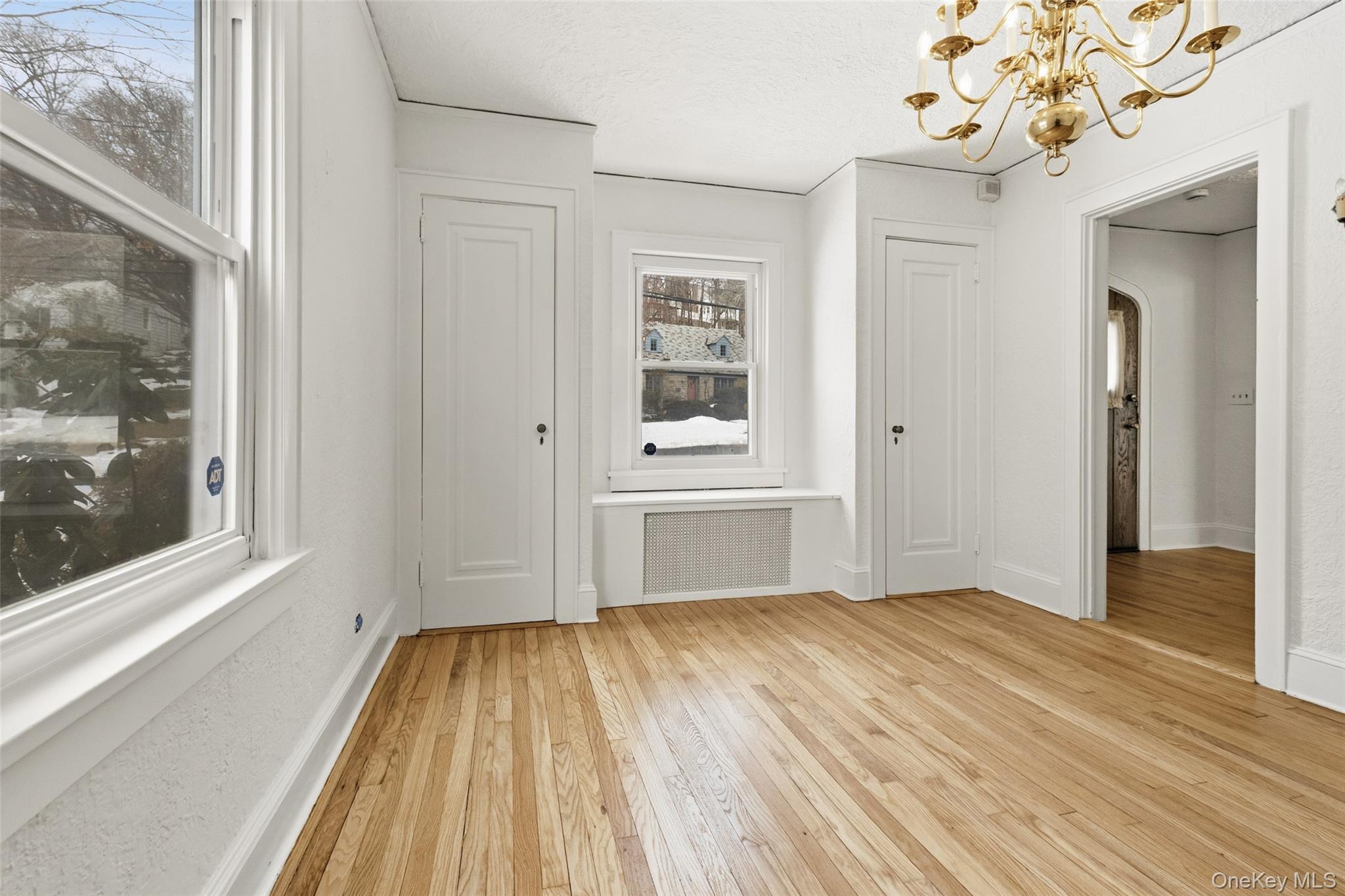 23 Garretson Road White Plains, NY 10604 - Photo 16 of 33 a view of a room with wooden floor and a window