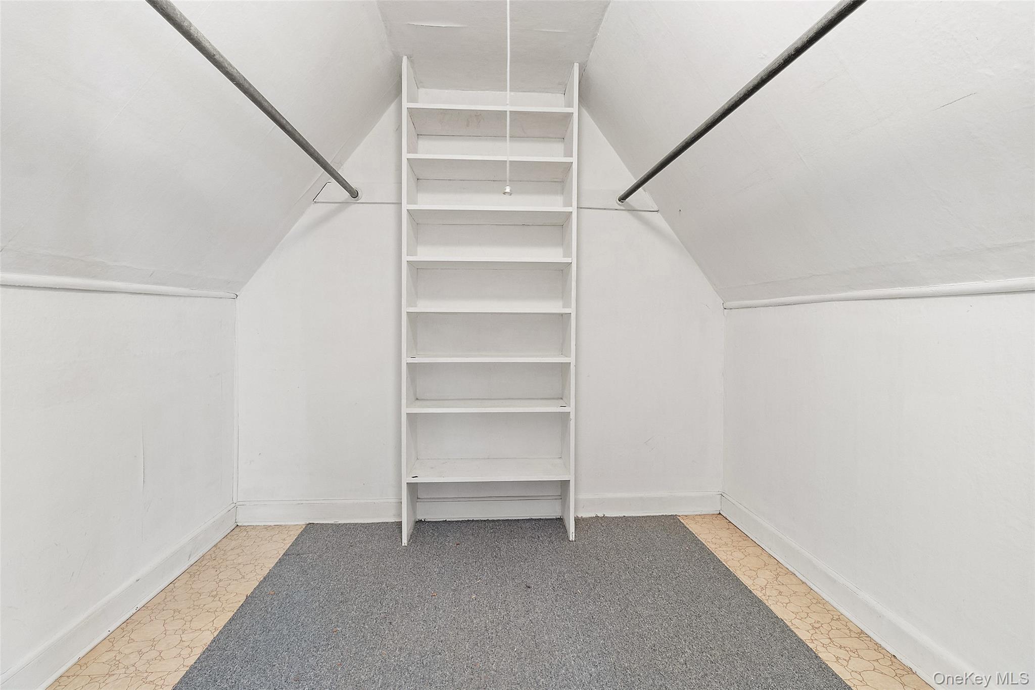 23 Garretson Road White Plains, NY 10604 - Photo 27 of 33 a view of an empty walk in closet