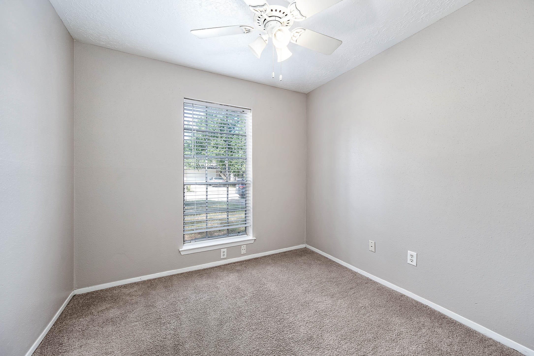 4918 Quailgate Drive Spring, TX 77373 - Photo 13 of 17 an empty room with a window