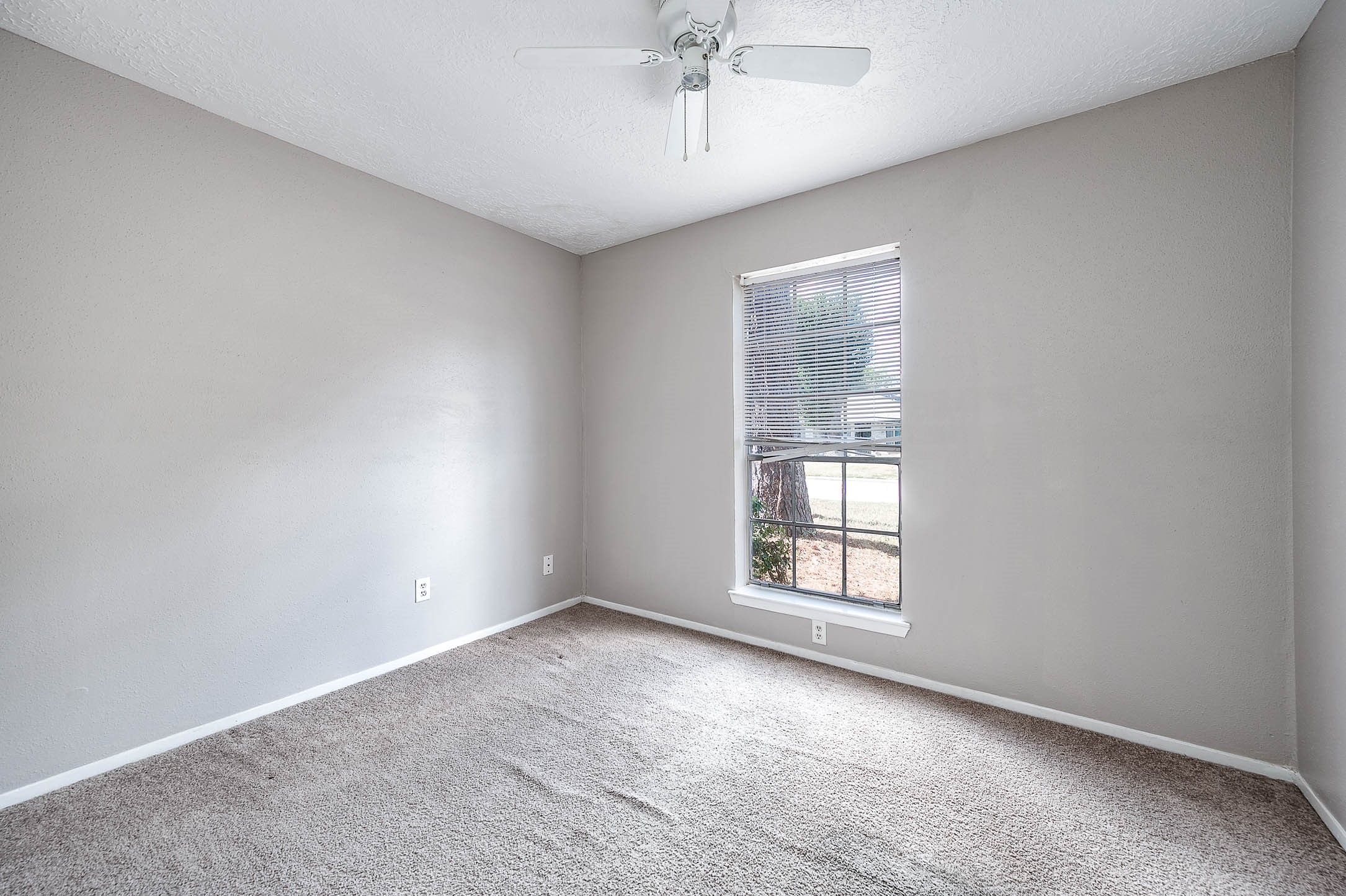 4918 Quailgate Drive Spring, TX 77373 - Photo 15 of 17 an empty room with a window