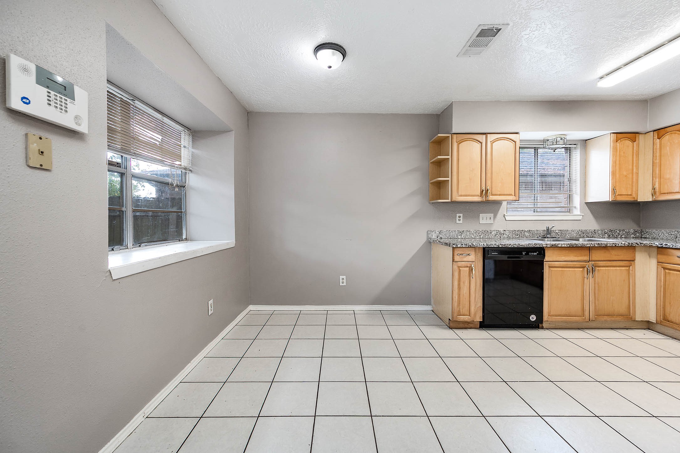 4918 Quailgate Drive Spring, TX 77373 - Photo 5 of 17 a view of a kitchen with a sink and cabinets