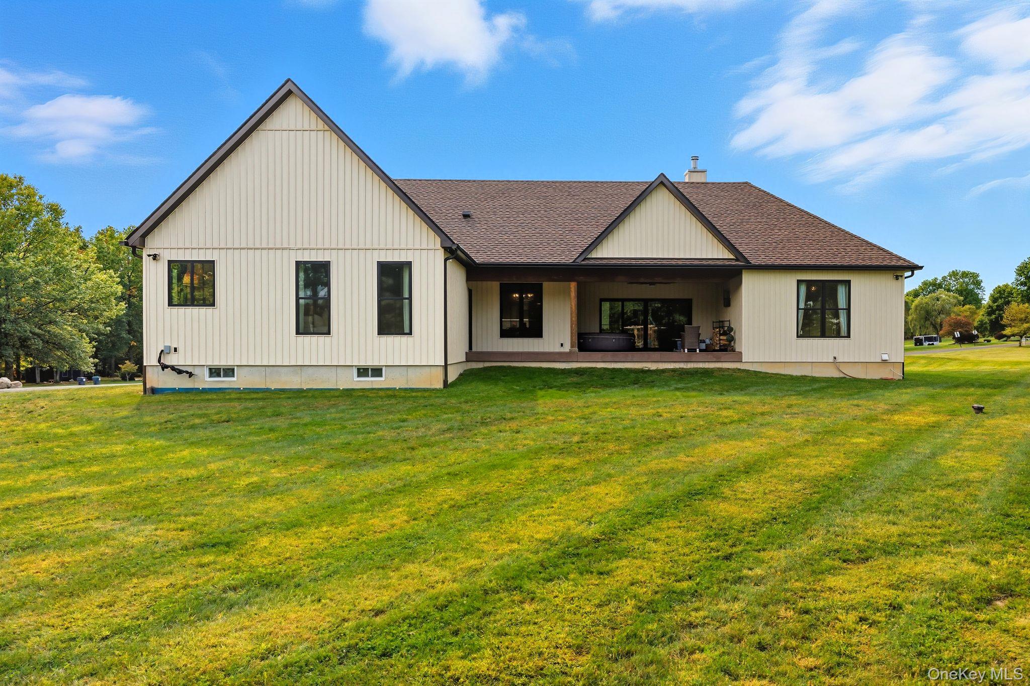 11 Knolls Road Wallkill, NY 12589 - Photo 16 of 48 a front view of house with yard and green space