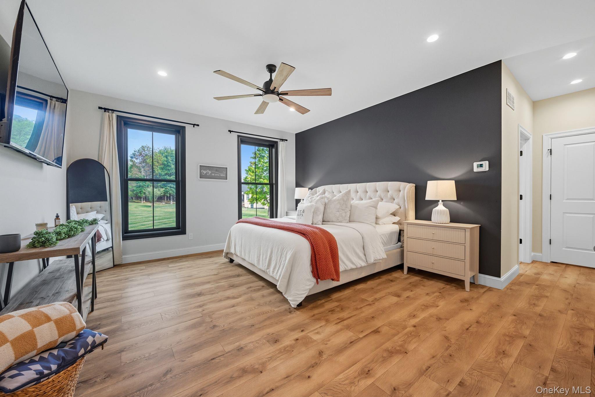 11 Knolls Road Wallkill, NY 12589 - Photo 24 of 48 a spacious bedroom with a large bed and windows