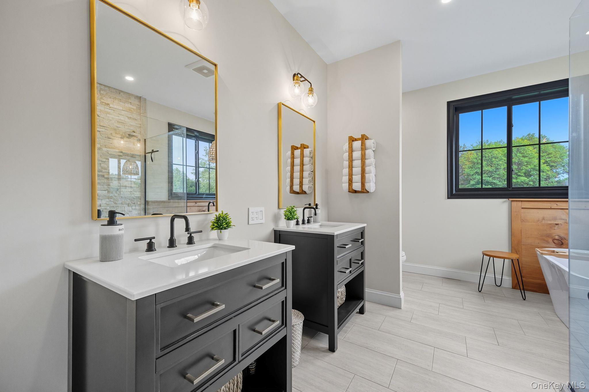 11 Knolls Road Wallkill, NY 12589 - Photo 26 of 48 a bathroom with a sink double vanity and a mirror