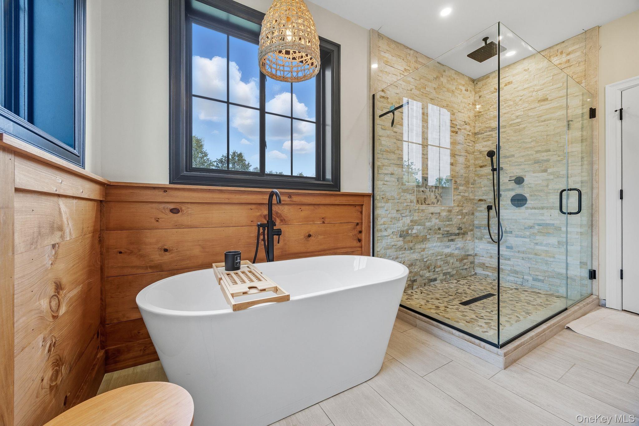 11 Knolls Road Wallkill, NY 12589 - Photo 27 of 48 a white bath tub sitting next to a toilet