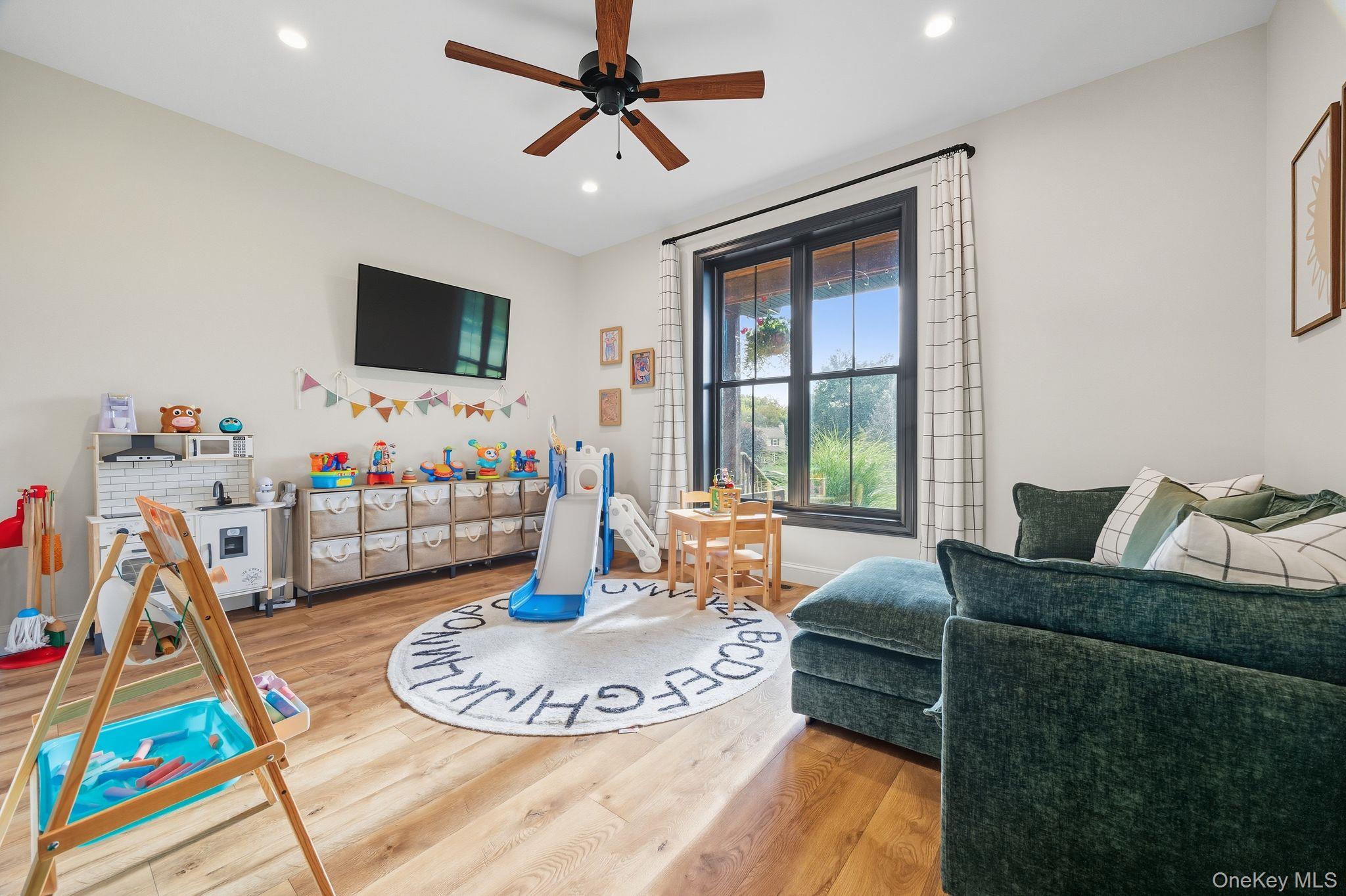 11 Knolls Road Wallkill, NY 12589 - Photo 31 of 48 a living room with furniture and a flat screen tv