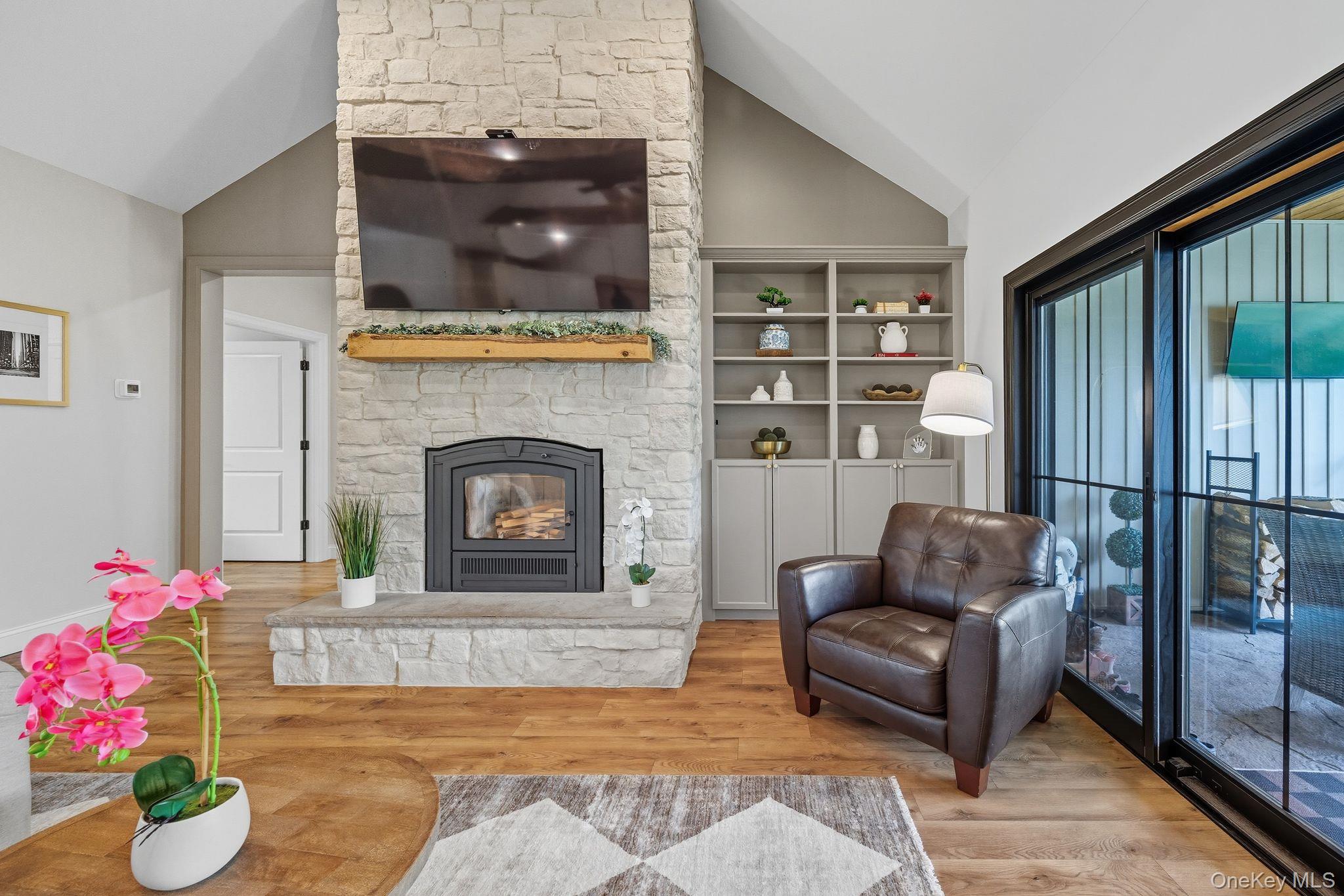 11 Knolls Road Wallkill, NY 12589 - Photo 33 of 48 a living room with furniture and a fireplace