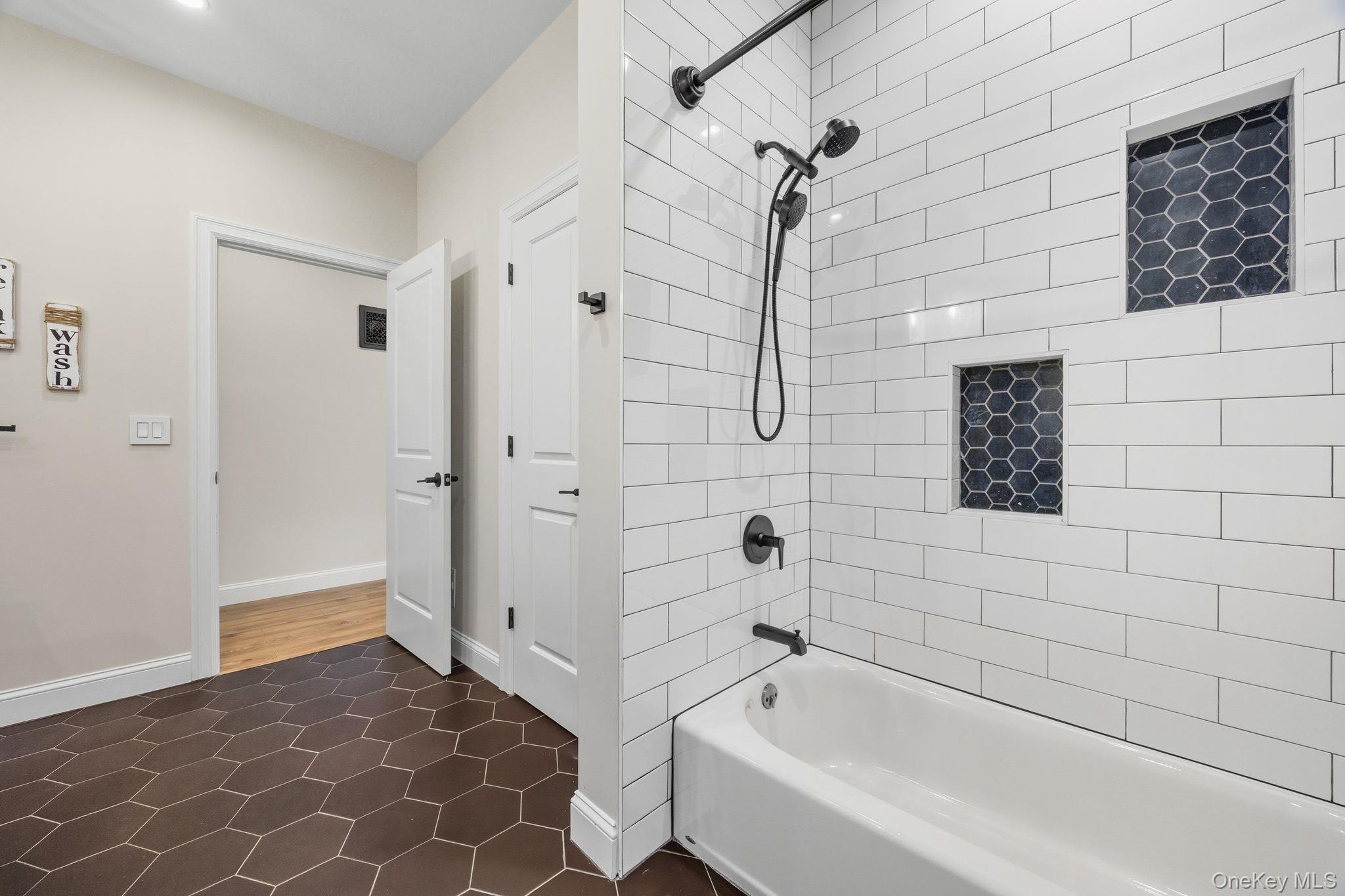 11 Knolls Road Wallkill, NY 12589 - Photo 41 of 48 a bathroom with a bathtub and shower
