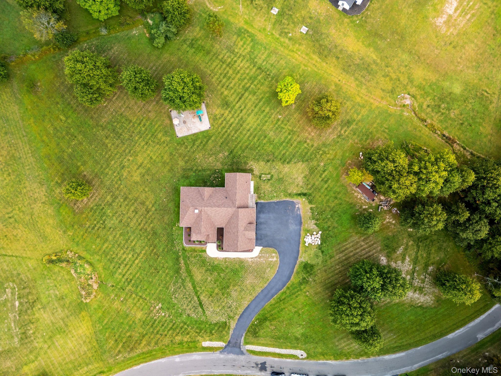 11 Knolls Road Wallkill, NY 12589 - Photo 7 of 48 a bird view of a house with a garden and trees