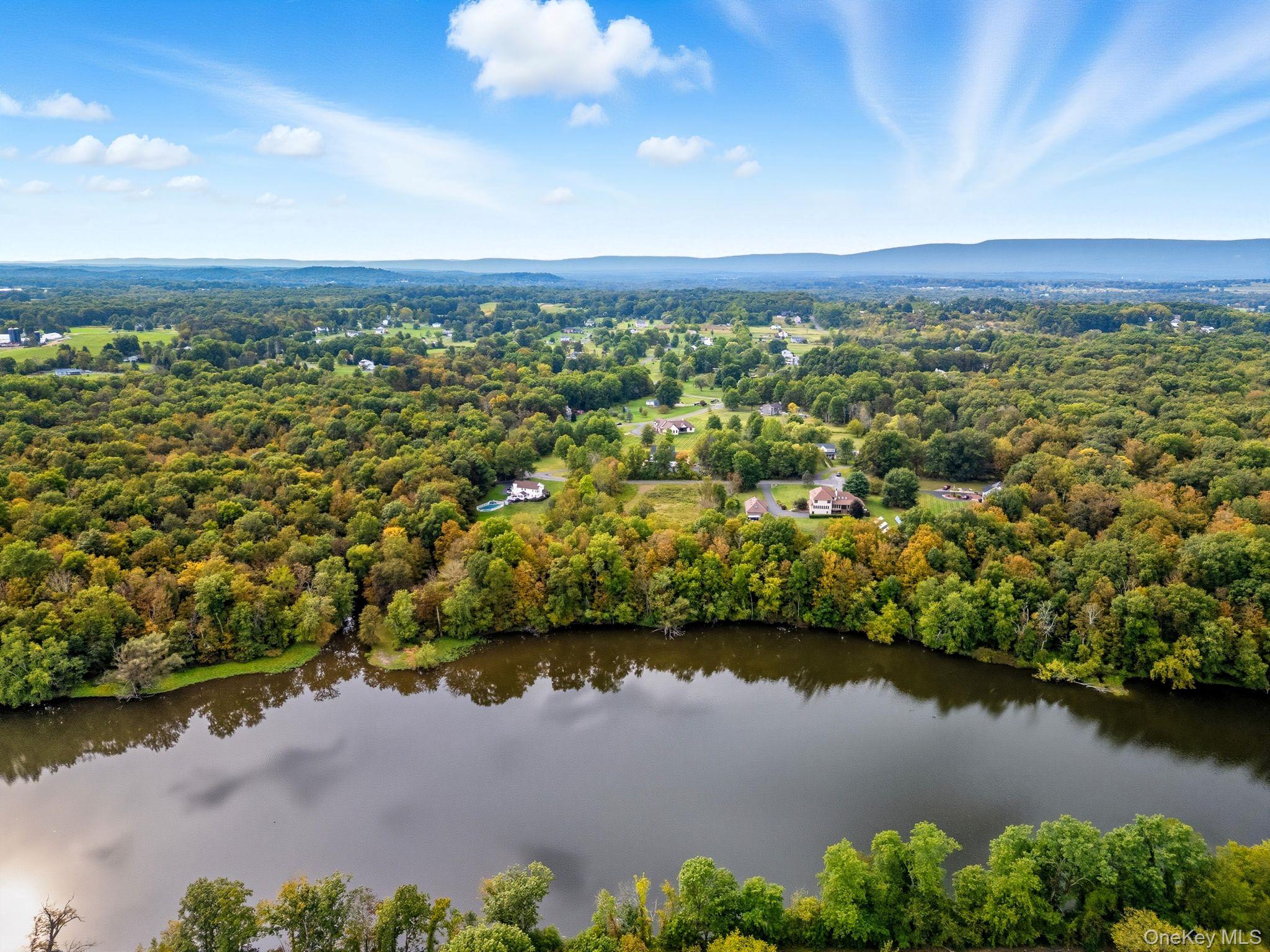 11 Knolls Road Wallkill, NY 12589 - Photo 9 of 48 an aerial view of residential building and lake