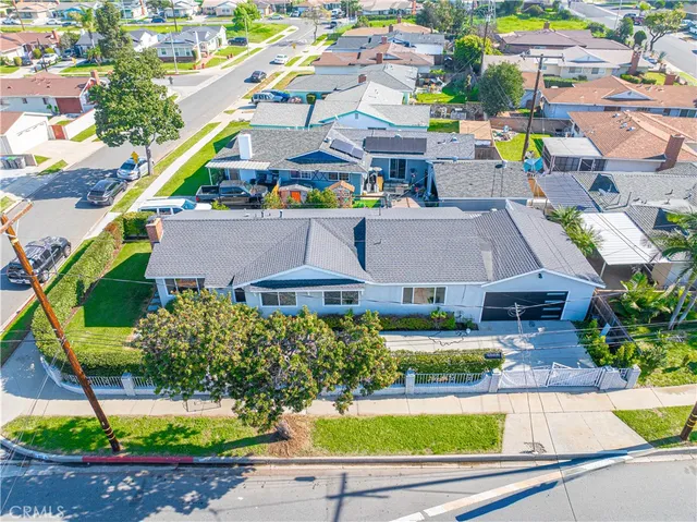 a aerial view of a house with a garden and plants