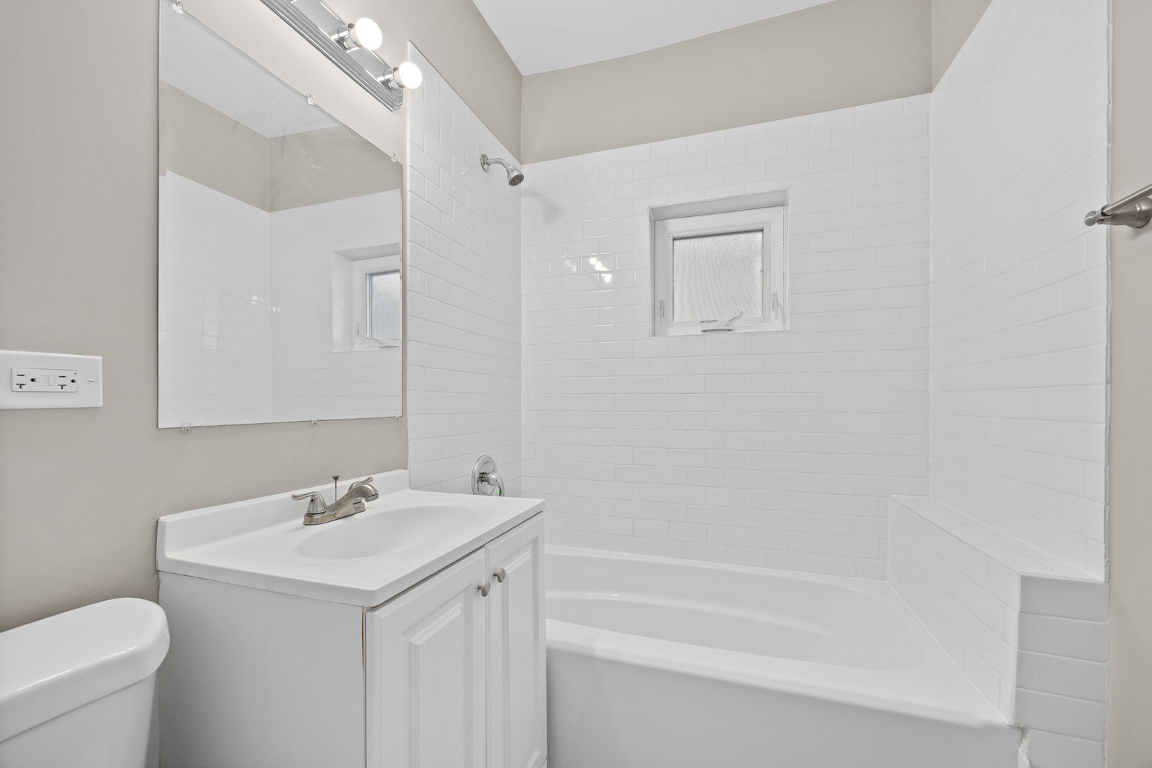 6535 26th Place Berwyn, IL 60402 - Photo 16 of 26 a bathroom with a sink a toilet and shower