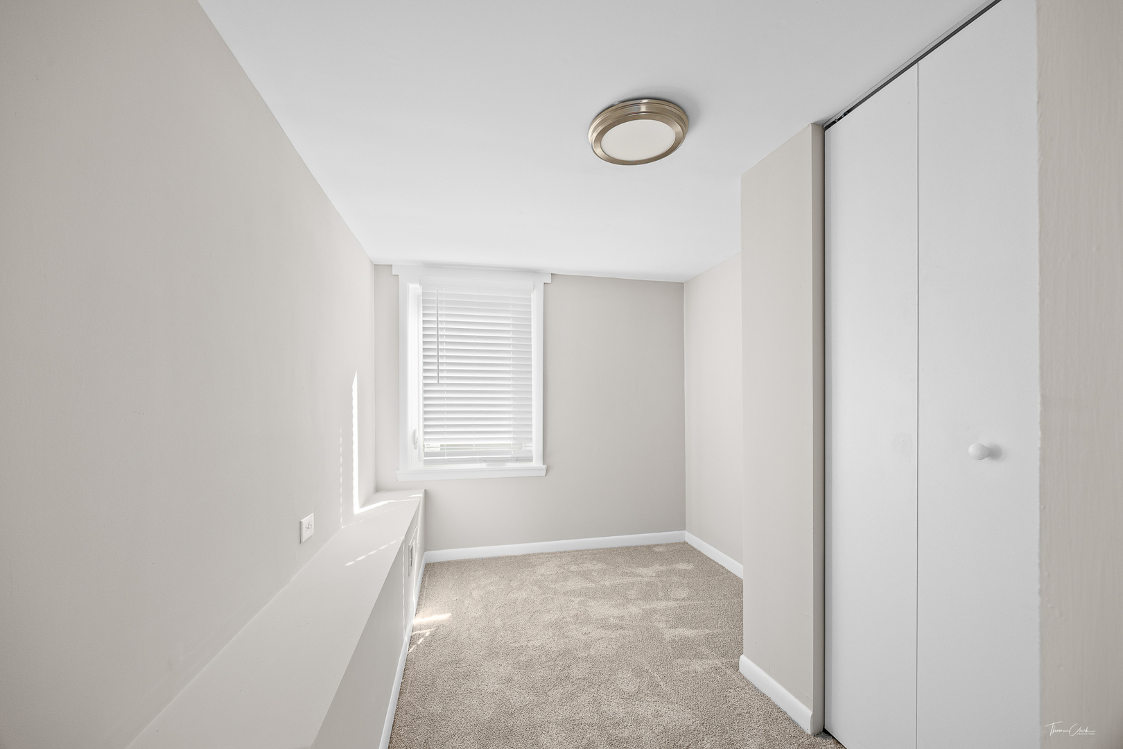 6535 26th Place Berwyn, IL 60402 - Photo 20 of 26 a view of an empty room with a window