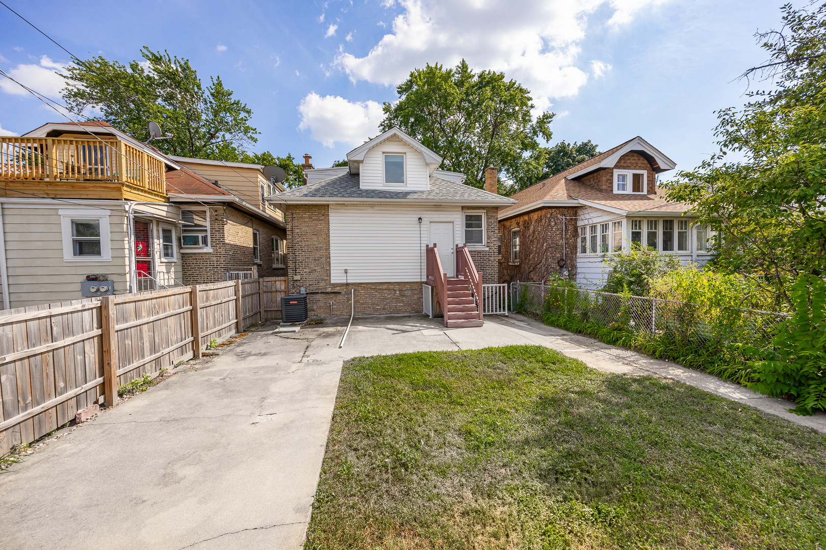 6535 26th Place Berwyn, IL 60402 - Photo 3 of 26 a view of a house with a yard and potted plants