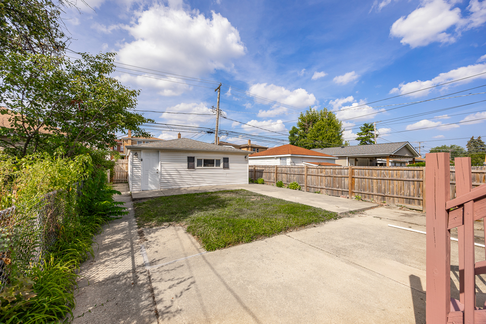 6535 26th Place Berwyn, IL 60402 - Photo 4 of 26 a front view of a house with garden