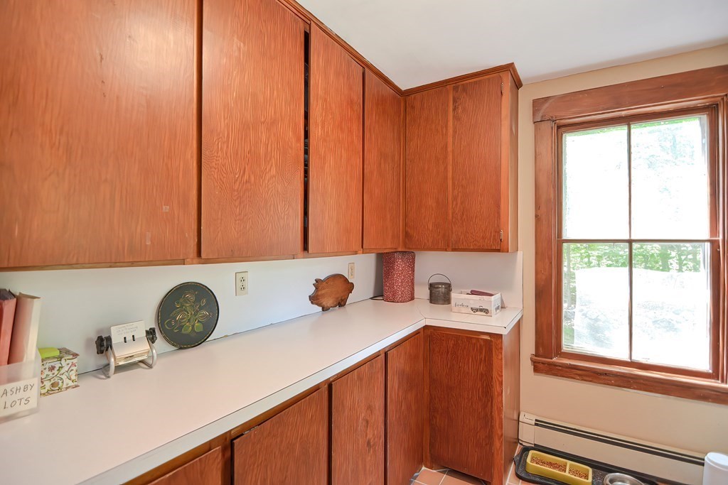 244 Davis Road Ashby, MA 01431 - Photo 15 of 35 a kitchen with a sink cabinets and a window