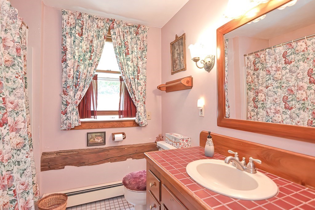 244 Davis Road Ashby, MA 01431 - Photo 20 of 35 a bathroom with a sink and a mirror